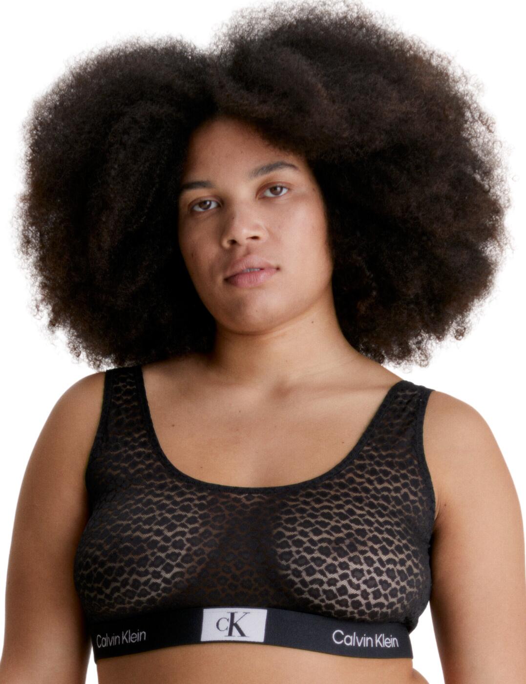 Bring out your wild side in the Calvin Klein Animal Lace bralette! This stylish, comfortable plus bralette has everything you need to feel confident and sexy. With a classic Calvin Klein printed underband, this bralette provides natural shaping with its non-padded cups. The pull-on design and fixed wide straps create a flawless finish. Plus, the semi-sheer fabric with animal print-inspired lace detailing keeps the look playful and fun.  Stylish bralette Classic CK printed underband Non-padded for natural shape Wireless for comfort Pull-on design Fixed wide straps Comfortable fit Semi-sheer finish Animal lace detailing Country of origin: Sri Lanka Composition: 52% Recycled Nylon &pipe; 38% Nylon &pipe; 10% Elastane Listed in UK sizes  60241-105475-1399308 000QF7234E Bralette