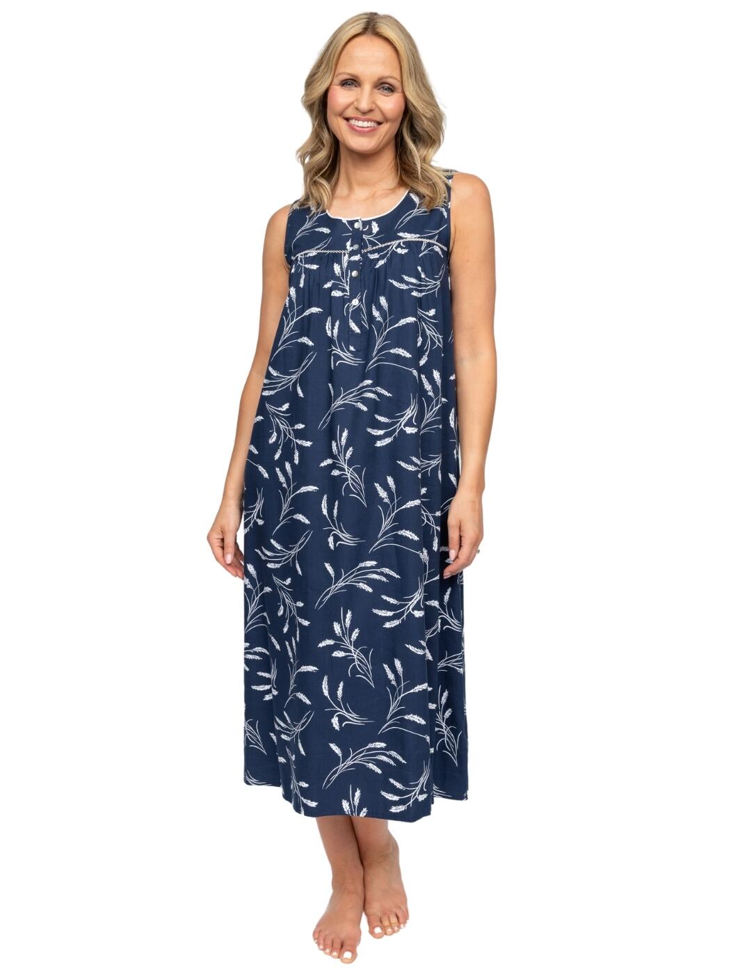 Slip into dreamlike slumber with the Louisa wheatsheaf print long nightdress by Cyberjammies Nora Rose. Crafted from exceptionally soft, sustainable fabric, this mid-calf length nightdress promises ultimate comfort as you unwind. Timeless sophistication is ensured thanks to the repeating wheatsheaf print, complemented by wide, comfortable shoulders and a sleeveless style for a relaxed fit. What's more, the button-up, rounded neckline allows for easy and adjustable wear, accented by chic sequin details to add subtle sparkle to your evenings indoors. Wear with coordinating Louisa nightwear for cohesive comfort.