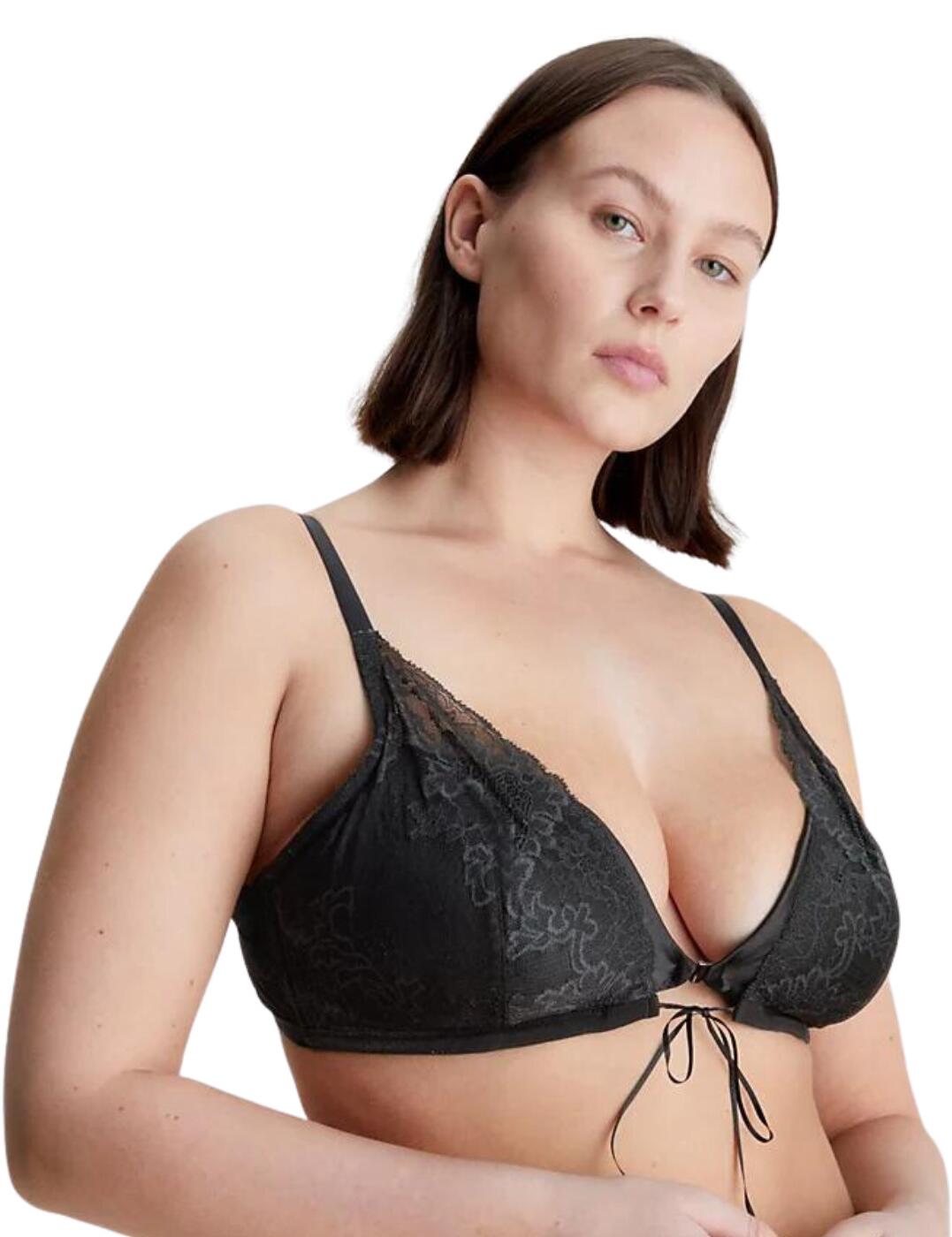 Are you looking for an elegant lingerie piece with a unique style? Look no further than the Calvin Klein CK Black triangle bra! With moulded cups to shape and offer support, wireless design for ultimate comfort, adjustable straps for a perfect fit, and stunning ribbon tie detail on the front fastening - you will feel amazing! Shop now to add a touch of elegance to your lingerie collection with Calvin Klein!  Elegant triangle bra Moulded cups for shape Wireless for comfort Adjustable shoulder straps Front fastening with beautiful ribbon tie detail Unique style Country of origin: Thailand Composition: 76% Polyamide &pipe; 24% Elastane Listed in UK sizes  60582-105474-1399377 000QF7160E Bralette