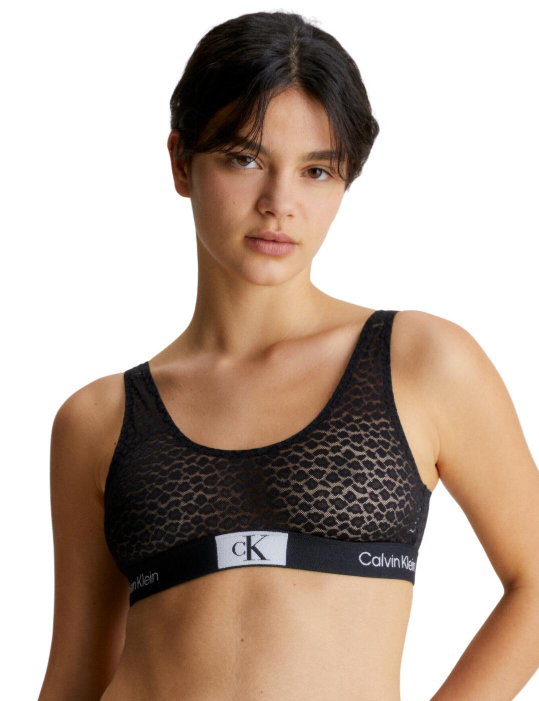 If you're looking for lingerie that offers the perfect balance of style and comfort, Calvin Klein Animal Lace unlined bralette would be the perfect choice for you. This classic design provides support without restricting movement, featuring a wireless fit that allows you to move with ease. The fixed straps offer security, while the pull on design makes it easy to slip in and out of this lingerie. Plus, the semi-sheer animal print adds an extra touch of style without sacrificing comfort. Opt for something more comfortable with this classic Calvin Klein bralette and finish this look with the matching lingerie available from this collection.  Classic bralette Unlined, no padding Wireless Fixed straps Pull on design Animal print Semi-sheer design Matching lingerie available Country of origin: Thailand Composition: 52% Recycled Polyamide &pipe; 38% Polyamide &pipe; 10% Elastane Listed in UK sizes  60583-105476-1399317 000QF7233E Bralette