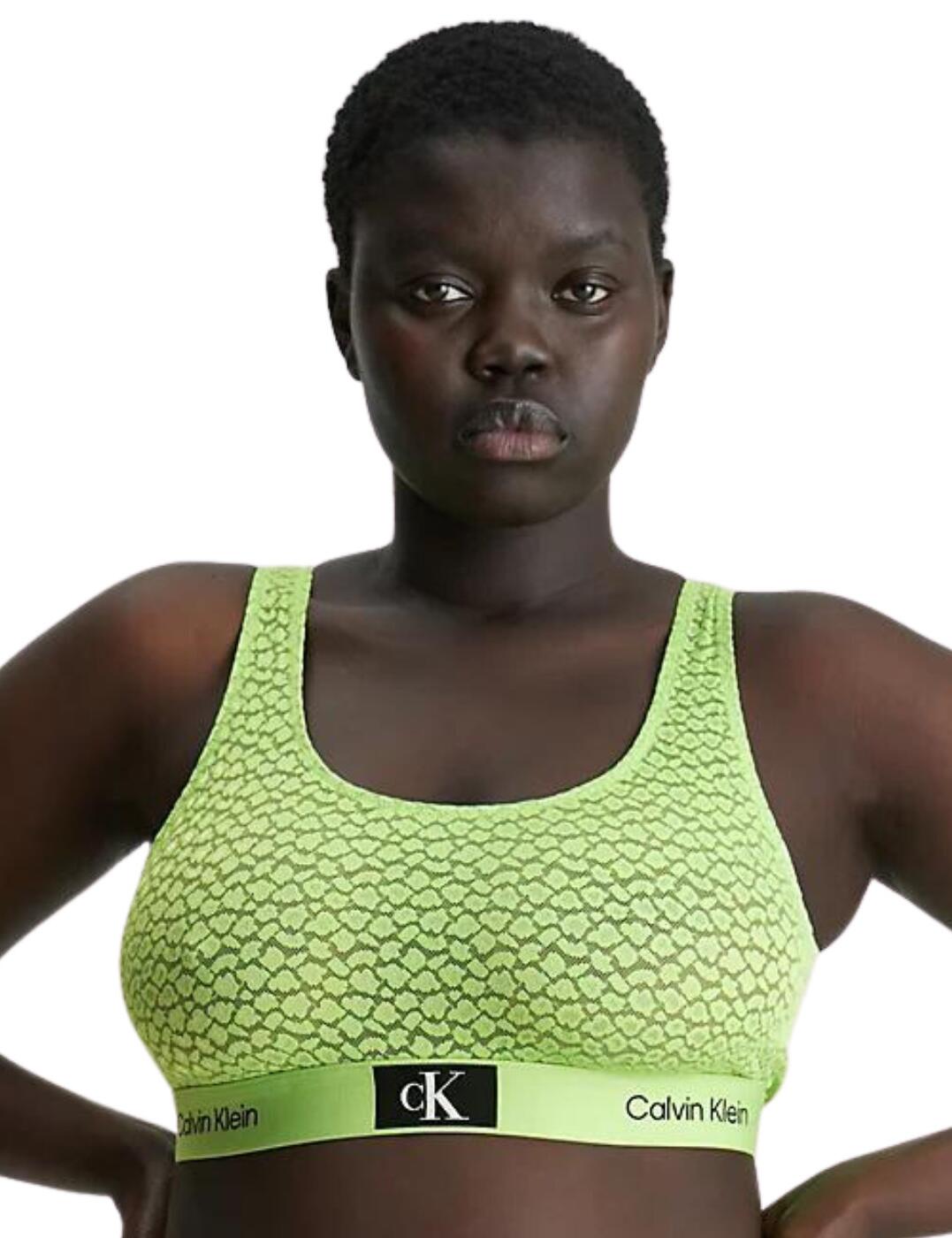 The Calvin Klein CK96 lace bralette is the perfect choice for women who want to make a fierce fashion statement. Combining a young attitude with amplified classics, this bralette features an all-over leopard texture made with recycled fibres for total sustainability and maximum impact. A semi-sheer finish adds boldness and sexiness while the open-back design ensures breathability. Plus, no padding in this design gives you a super natural look that’s totally on-trend. Secure comfort is guaranteed through its simple pull-on design and wire-free cups, as well as the brand’s signature elastic underband for complete hold and support.  Leopard print texture on lace Non-padded Unlined Wire-free Simple pull-on design Elasticated underband Calvin Klein's signature logo detailing Scoop neck design Fixed shoulder straps Country of origin: Sri Lanka Composition: 52% Recycled Nylon &pipe; 38% Nylon &pipe; 10% Elastane Listed in UK sizes  60593-105490-1399436 000QF7233E Bralette