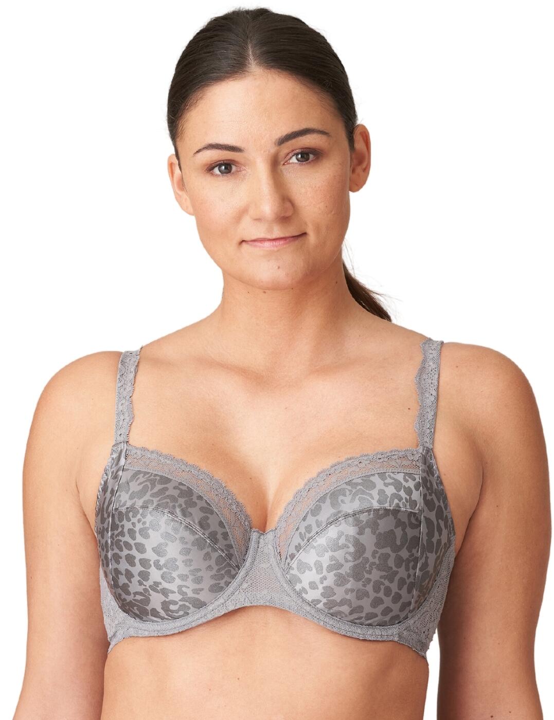 Add a touch of subtle sophistication and indulgence to your essential lingerie collection with the Prima Donna Twist's Cobble Hill full cup bra. Crafted from luxurious shimmery animal print fabric and a scalloped lace trim, this captivating full cup design creates a modest silhouette. The supportive underwired structure provides support and the adjustable shoulder straps ensure comfort while non-padded cups ensure the utmost comfortable fit. Complete the look with matching lingerie from the stylish Cobble Hill lingerie collection by Prima Donna.