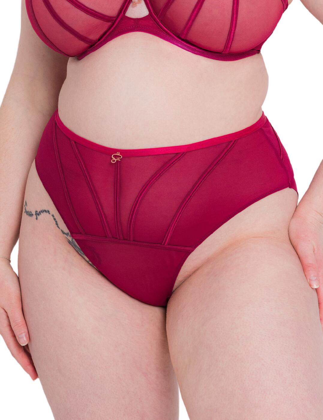 A must-have to any collection is a figure-flattering brief. This high-waisted brief comes to you from the Senses range by Scantilly by Curvy Kate. Made from sheer stretch mesh it creates an exposing style, whilst contrasting on the rear for extra allure as well as comfort as the material softly blends into your skin. Satin strapping detailing across the piece adds an heir of glamour as well as allure. Moderate rear coverage allows for slight cheeky exposure as well as dreamy comfort. Sitting flawlessly along your waistline if flatters your figure and enhances your curves. Combined with high cut legs it creates the illusion of elongated legs. With a lined gusset the piece is also sure to never forget your comfort.