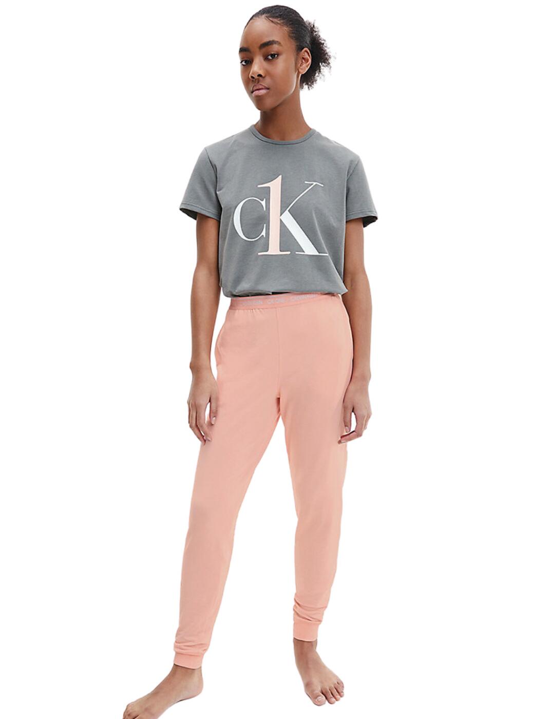 Up your loungewear game with these CK One Cotton joggers from Calvin Klein. These joggers feature a classic fit with full-length legs, cuffed ankles, handy side pockets and the Calvin Klein signature waistband. Calvin Klein ensures comfort with super soft fabric that feels dreamy against your skin.  Joggers Full length Cuffed ankles Side pockets Signature Calvin Klein branded waistband Crafted from super-soft fabrics Country of origin: Sri Lanka Composition: 57% Cotton &pipe; 38% Polyester &pipe; 5% Elastane Listed in UK sizes  56369-100072-1296771 000QS6429E Joggers