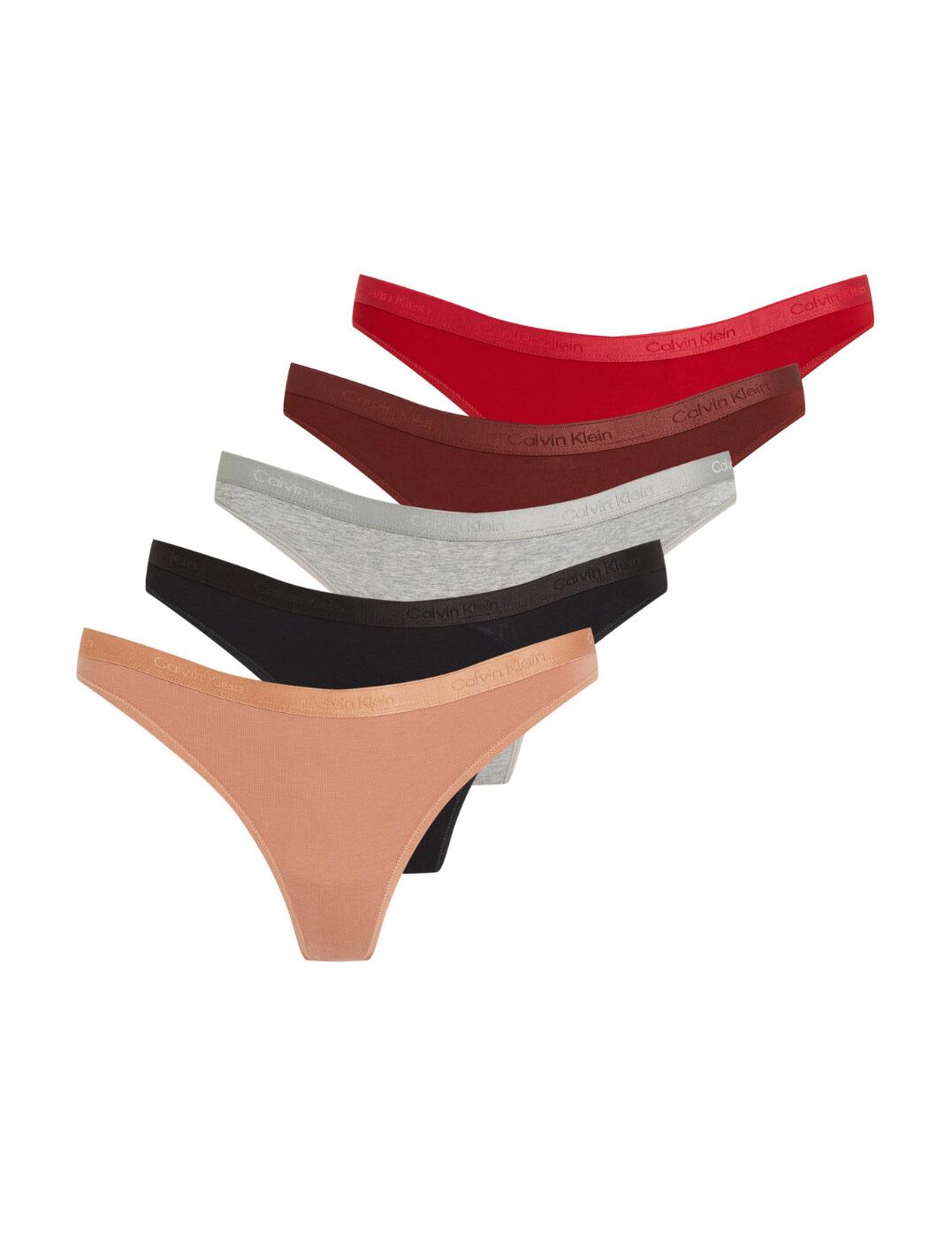 Feel sleek and chic in the Calvin Klein Modern Logo thong 5 pack. Crafted with the finest materials, each thong features a low-rise waist that sits perfectly on the hips, enhancing your curves and giving you a flattering silhouette. The flat edge finish ensures no visible panty lines, giving you the confidence to wear tight-fitting clothes without any worries. But what sets these thongs apart is the iconic Calvin Klein signature elastic waistband. With minimal rear coverage, these thongs offer just the right amount of skin exposure, creating a flirty and alluring look. Whether you're wearing them for a special occasion or everyday wear, you'll feel like a true fashion icon in these designer lingerie pieces.