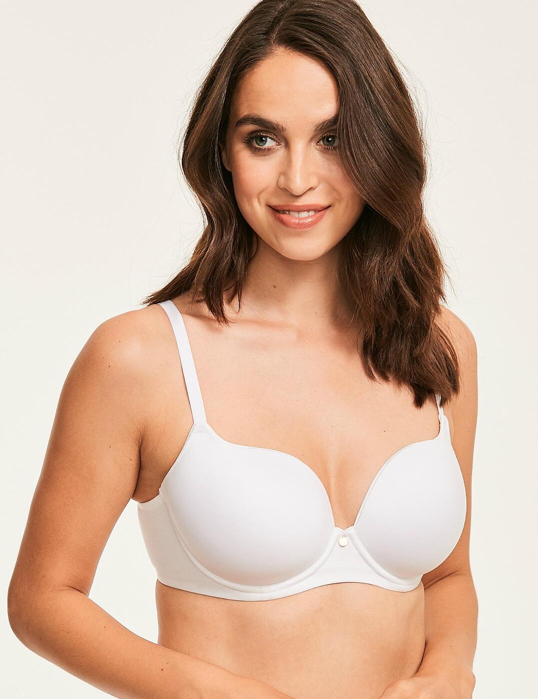 The Figleaves Smoothing Sweetheart Full Cup T-Shirt Bra provides ultimate shaping and support, an essential must have addition to any lingerie wardrobe. Invisible under clothes this bra is the perfect partner through the day. It features padded and underwired cups for a gorgeous look and rounded cleavage.The stunning bra also features adjustable straps, and fastens at the rear using a hook and eye closure for an individual fit that suits you!  Gorgeous, feminine style T-shirt bra style Underwired for support Padded cups Adjustable straps Hook and eye closure Composition: 78% Polyamide, 17% Elastane, 5% Cotton Listed in UK sizes  40370-73809-987301 1831021 T-shirt Bra