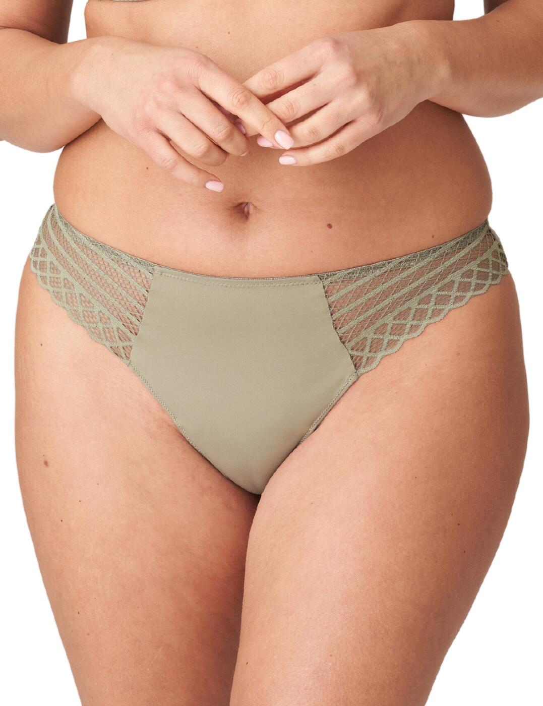 If you’re looking for lingerie with luxurious flair the Prima Donna Twist East End thong. This low rise thong offers minimal rear coverage paired with a smooth and simple design that highlights your curves in all the right places. A geometric lace detail adds a touch of femininity, while still remaining understated. Perfect paired with its matching lingerie – or any of your favourite pieces – you'll love it from the moment you slip it on. So go ahead and treat yourself to a beautiful piece of lingerie with the Prima Donna Twist East End thong!  Luxurious thong Low rise waist Minimal rear coverage Geometric lace details Smooth and simple design Matching lingerie available Country of origin: Tunisia Composition: 76% Polyamide &pipe; 14% Elastane &pipe; 10% Cotton Listed in UK sizes  60825-105775-1391494 0641930 Brief