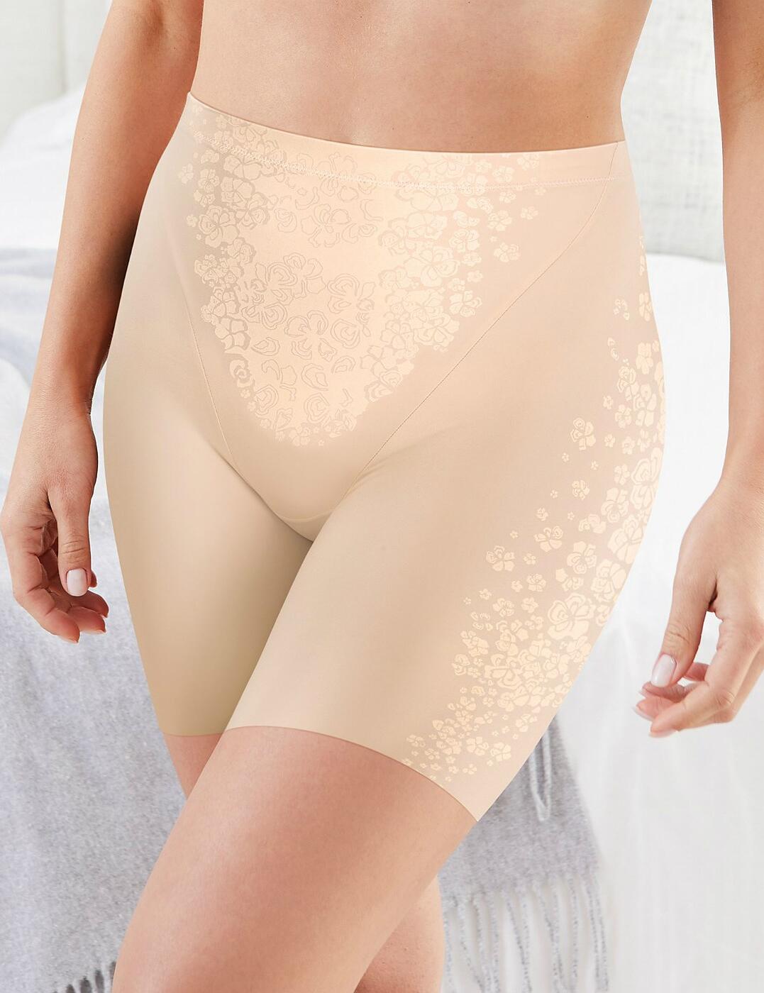 Flaunt your curves! Maidenform presents it's highly popular Thigh Slimmer shorty range! Combining a comfortable and contemporary fit and feel with chic and sophisticated styling, this brief provides an all round stunning shape!  Sexy feminine style Provides a brilliant shape! Offers great coverage Easy to wear - slips on Popular high-waist design offering a flattering waistline! Comfortable and contemporary fit Ultra spot control to flatten tummy, smooth hips and lift rear Listed in UK sizes  30567-74329-991332 DM0071 Shaping Shorty