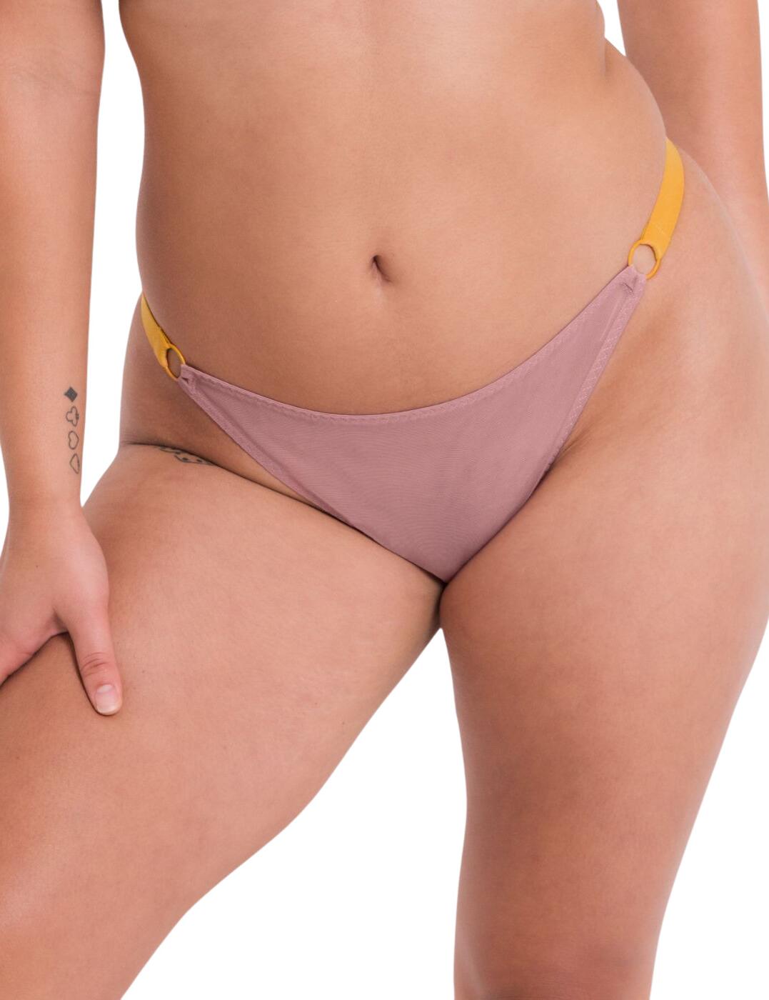Are you looking to add a bit of sophistication and femininity to your lingerie collection? Look no further than the Curvy Kate Front and Centre Brazilian brief! This gorgeous brief is designed with a low rise waist, minimal rear coverage, strappy sides, and a cheeky keyhole cutout that adds just enough flirtatiousness. With its delicate lace details on the rear, this Brazilian brief looks stunning from front to back. To complete this set snap up the matching lingerie available from this stunning range today!  Gorgeous Brazilian brief Low rise waist Minimal rear coverage Strappy sides Feminine lace details on the rear Cheeky keyhole cutout Matching lingerie available Country of origin: China Composition: Main: 85% Polyamide &pipe; 15% Elastane Composition: Lace: 88% Polyamide &pipe; 12% Elastane Composition: Gusset: 100% Cotton Listed in UK sizes  60893-105843-1393609 CK052202 Brazilian Brief
