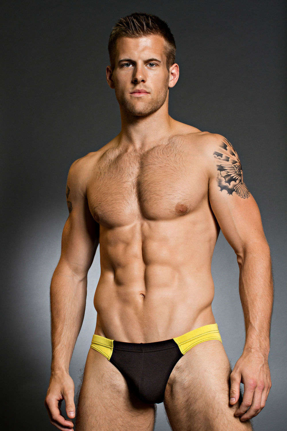 Smart micro bikini brief from Doreanse available in turquoise and white or black and yellow with a double layered pouch