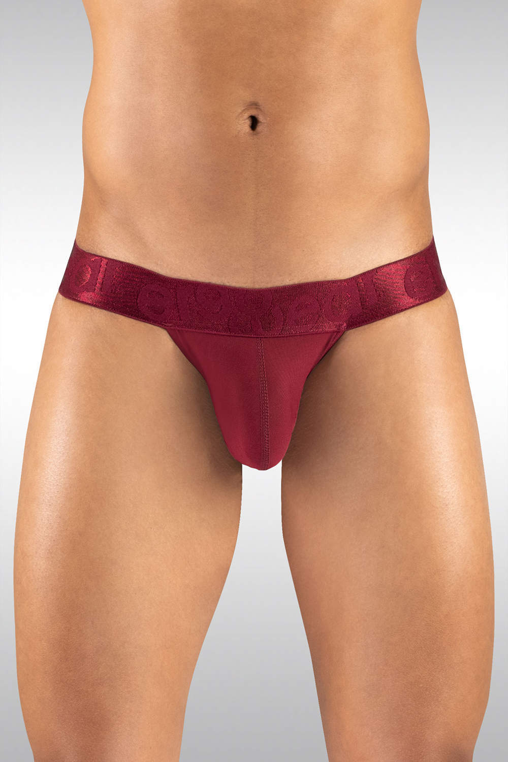 Combining men's thong underwear and a tanga brief this enhancing string slip for men is silky and sexy. International shipping. Plain parcels. Buy now