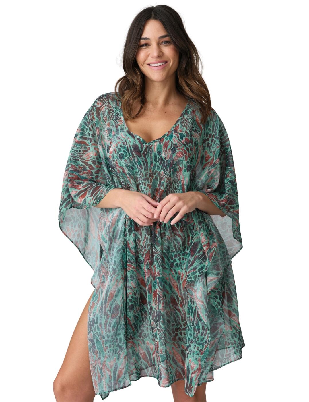 Flatter your femininity with Prima Donna Swim's Riyad kaftan, your new passport to poolside elegance. This luxurious kaftan is designed for leisurely days in paradise, with lightweight, sheer fabric that drapes gracefully down to your knees. The elasticated waistline ensures a flattering fit, accentuating your curves without sacrificing the flowing silhouette, while the low, feminine neckline and wide side splits add a shade of allure, perfect for transitioning from hot days to cooler dusks. Wear over matching Riyad swimwear for cohesive luxury.