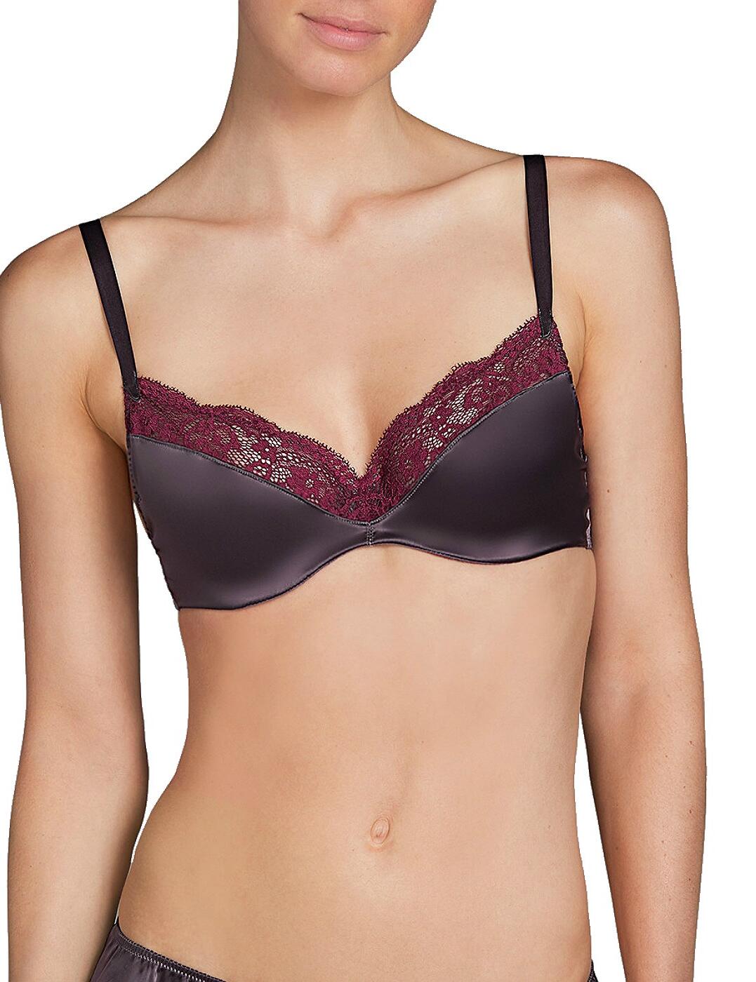 The new Gstaad full cup bra from Andres Sarda is perfect for those who seek top-tier lingerie. With half cup lace and flower embroidery this really is one to make to you feel luxurious in your lingerie. It combines comfort and contemporary styling whilst giving you full coverage, this really is one to have in your wardrobe. This bra is underwired to offer great support and uplift, and it is padded for a great shape. The bra has adjustable straps that can be adapted for an individual fit and secures at the rear with a traditional hook and eye fastening.  Chic and elegant design Comfortable fit Underwired support Padded cups Popular full cup design Beautiful lace on the upper cups Adjustable straps Hook and eye closure at the rear Composition: 47% Polyamide, 42% Polyester, 11% Elastane  Listed in UK sizes  41226-75537-1003607 3307810/3307811 Full Cup Bra