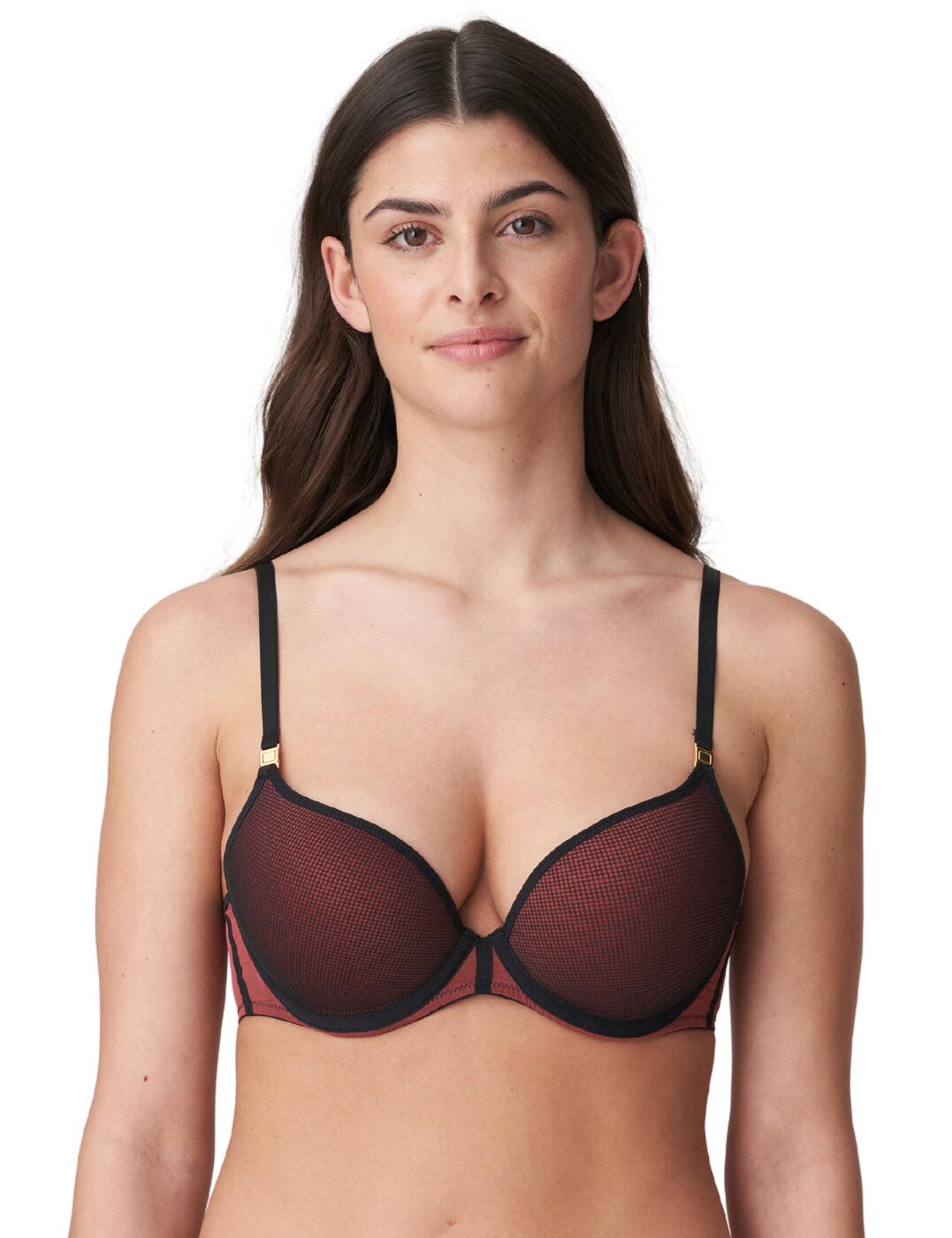 Spoil yourself with the Marie Jo Fezz push up bra! This is a light yet supportive and comfortable lingerie piece you won't want to miss out on. Crafted with padded cups for an unparalleled uplift, underwired support and adjustable straps so you can always find the fit that is perfect for you. For added visual interest to this simple yet seductive design, mesh detailing graces the cup. And that's not all: its straps are multiway, cleverly converting into a cross-back style – perfect for multiple looks. To complete your luxury look, there's matching lingerie available. The Fezz push up bra is just what you need to take your lingerie collection to the next level!  Perfect push up bra Padded cups for amazing uplift Underwired for support Hook and eye fastening Adjustable shoulder straps Mesh detailing on the cups Multiway straps that converts into a cross back Simple yet seductive design Matching lingerie available Country of origin: China/Nanhai Composition: 92% Polyester &pipe; 6% Polyamide &pipe; 2% Elastane Listed in UK sizes  61143-106117-1400928 0122329 Push Up Bra
