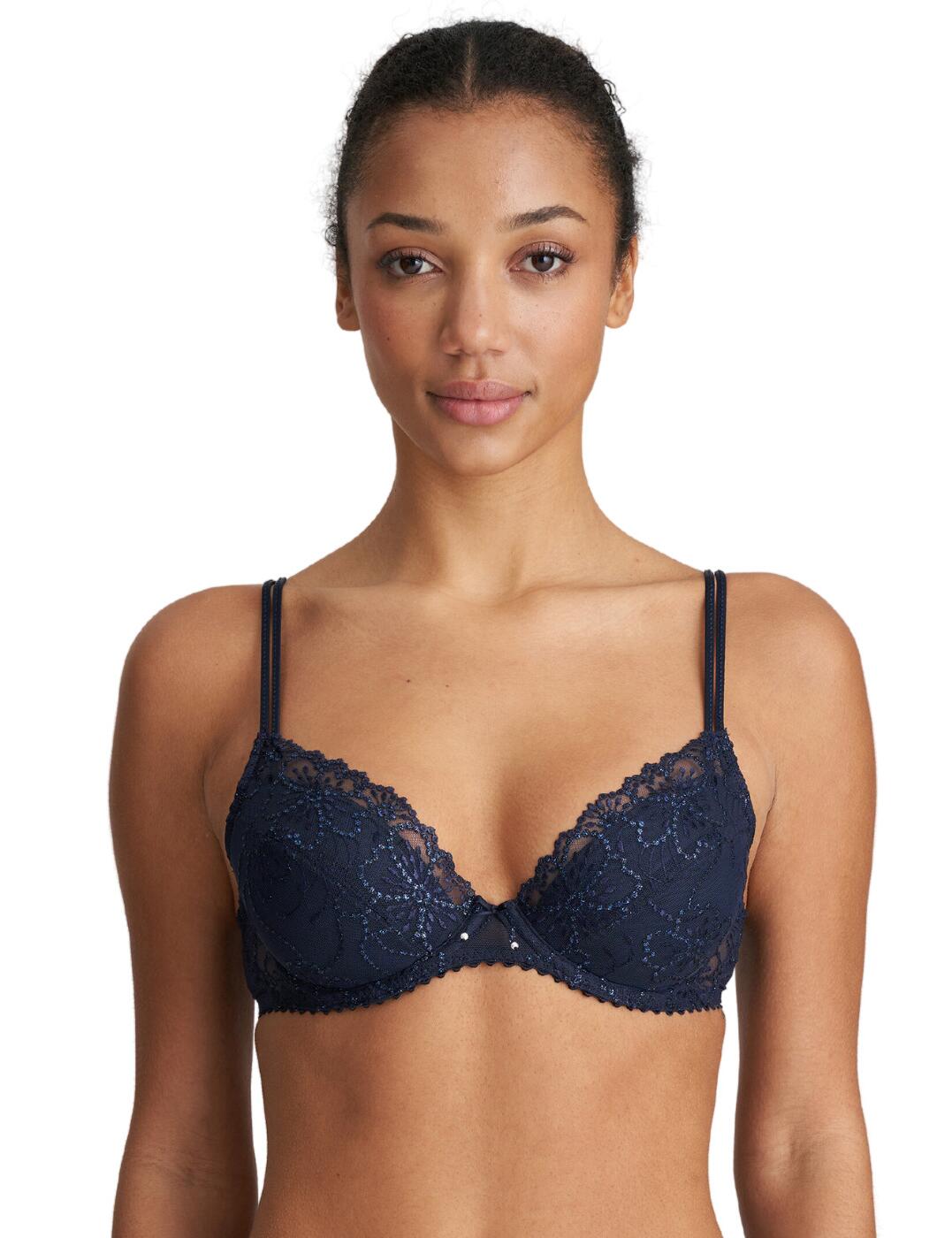 Discover the luxury and elegance of the Marie Jo Jane push up bra. Crafted from a soft fabric blend, this luxurious push up bra is designed for a flattering silhouette. This bra features removable padded pads for an individual look, underwired support, and hook and eye fastening for ultimate comfort. With adjustable shoulder straps and luxurious lace details on the cups, you’ll feel stunning in this gorgeous lingerie piece. Further detailing includes metallic embroidered accents and a bow finishing for added sophistication. Matching lingerie pieces are also available so you can complete your look with effortless grace. Slip into luxury – it’s time to treat yourself to the Marie Jo Jane push up bra.  Luxurious push up bra Removable padded pads Underwired for support Hook and eye fastening Adjustable shoulder straps Luxurious lace details Metallic embroidered details Bow finishing Matching lingerie available Country of origin: China Composition: 54% Polyester &pipe; 32% Polyamide &pipe; 14% Elastane Listed in UK sizes  61164-106138-1401701 0101337 Push Up Bra