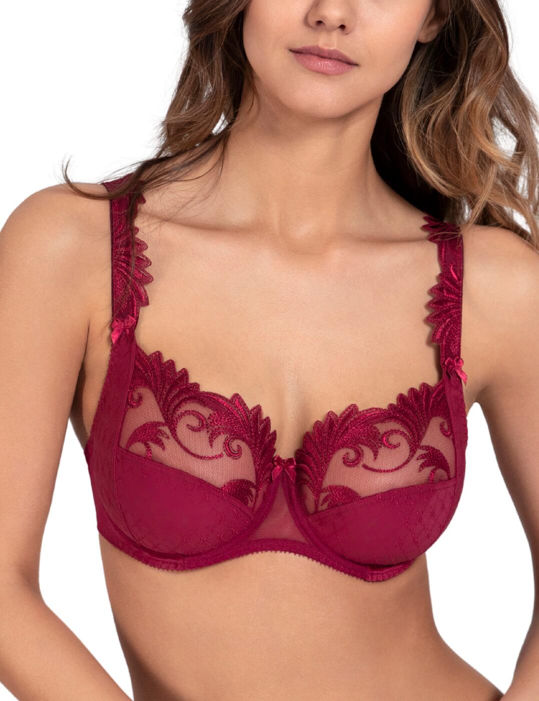 Experience ultimate luxury with the Empreinte Thalia full-cup bra. Crafted from the highest quality materials to ensure total comfort and support, this beautiful piece of lingerie is an essential piece for any modern wardrobe. It boasts a jacquard pattern on the bottom of the cup, sheer mesh detail on top of the cup, and a timeless embroidered floral pattern for a refined look. The underwire provides excellent support and ensures a natural look with its non-padded cups, while adjustable shoulder straps allow for a custom fit. Plus, it’s finished off with dainty bow detail at the centre front and embroidered scalloped neckline and on-shoulder straps – perfect for a feminine finish. Complete your classically chic set by matching it with other pieces from the Thalia collection.  Full cup bra Floral embroidered pattern Underwired for support Non-padded for a natural look Jacquard print on the bottom of the cup Sheer mesh on top of the cup Embroidery scalloped neckline and on-shoulder straps Dainty bow detail on the centre front Adjustable shoulder straps Hook and eye closure Matching coordinates available Country of origin: Morocco Composition: 63% Polyamide &pipe; 22% Elastane &pipe; 15% Polyester Listed in UK sizes  61240-106241-1405273 1756 Full Cup Bra