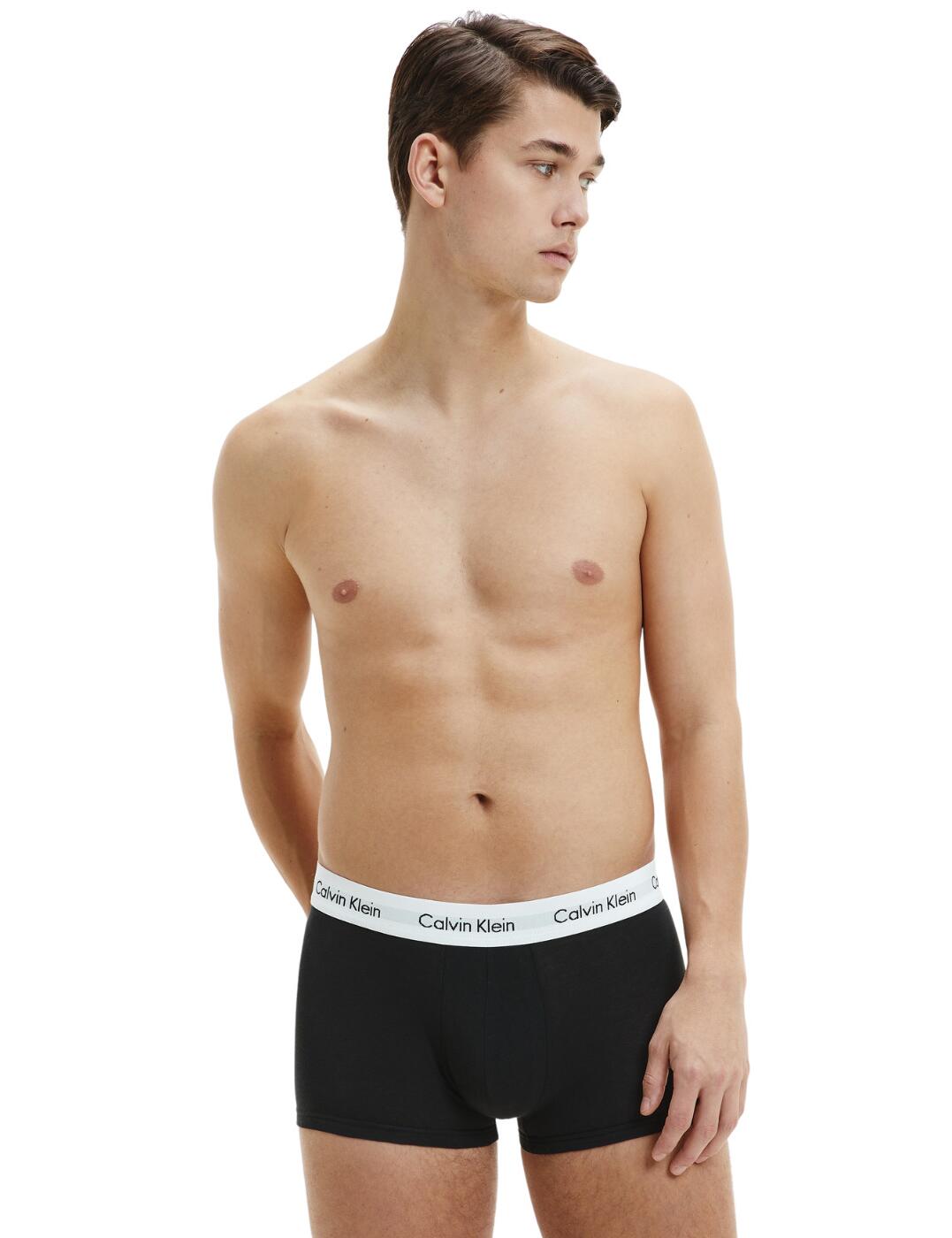 Update your underwear drawer with this 3-pack of low-rise trunks from Calvin Klein. From the Cotton Stretch range, these trucks ensure an all-day comfortable fit with super soft cotton fabric. It brings an everyday fit with a low-rise waist and has a mini short style. The set comes in a variety of colours and patterns with the much-loved Calvin Klein elastic waistband.  3 pack of trunks Low-rise waist and mini short style Soft cotton fabric Variety of colours and patterns Calvin Klein elastic waistband Country of origin: Bangladesh Composition: 95% Cotton &pipe; 5% Elastane Listed in UK sizes  56936-100758-1309140 0000U2664G  Men's Brief