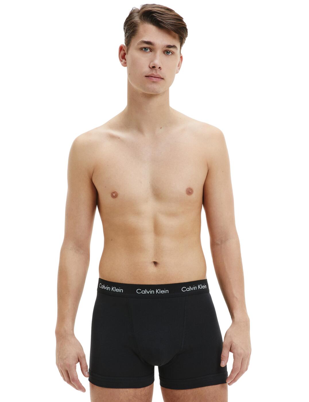 These 3 pack of men's trunks from the Cotton Stretch range by Calvin Klein is the perfect everyday underwear with their classic design and super comfortable fit. It has a simple look with a plain opaque fabric throughout and the much-loved Calvin Klein elastic waistband. The trunks have a mid-rise waist and a mini short-length style.  3 pack of trunks Plain opaque fabric with a branded elastic waistband Mid-rise waist Mini short style Comfortable fit Country of origin: Bangladesh Composition: 95% Cotton &pipe; 5% Elastane Listed in UK sizes  56946-100783-1309660 0000U2662G Men's Brief