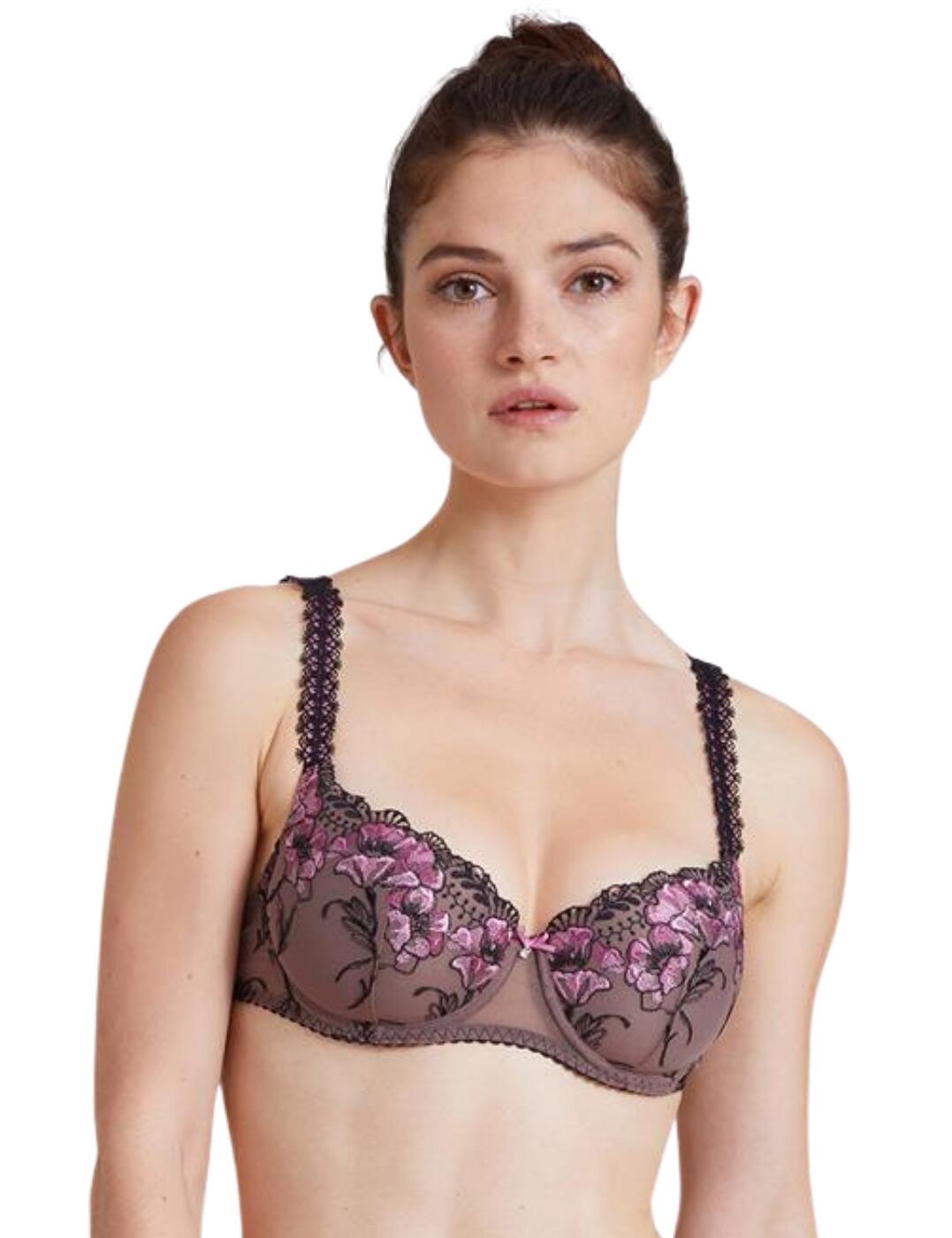 This A Fleur De Toi bra supports your curves while providing an unforgettable Aubade style. The classic balcony neckline is made that much more enticing by the half-cup design. The centre seam and moulded padding of the underwired cups provide support and shape your curves. The bra is decorated with enchanting embroidery, with the top of the cups featuring a delicate floral pattern in a contrasting colour. The adjustable shoulder straps are decorated with a stunning guipure band, which corresponds beautifully with the scalloped edges of the neckline.  Classic balcony style Stunning floral embroidery on the cups Semi-sheer materials 2-part half coverage cups Adjustable shoulder straps Hook and eye back closure Moulded cups Underwired Matching coordinates available Country of origin: Tunisia Composition: Embroidery: 55% Polyamide &pipe; 24% Polyester &pipe; 21% Elastane Composition: Cup embroidery: 52% Polyester &pipe; 35% Polyamide &pipe; 13% Elastane Composition: Cup lining: 100% Polyester Composition: Side lining: 100% Polyamide Composition: Tulle: 80% Polyamide &pipe; 20% Elastane Listed in UK sizes  54940-98032-1273898 IBN04 Half Cup Bra