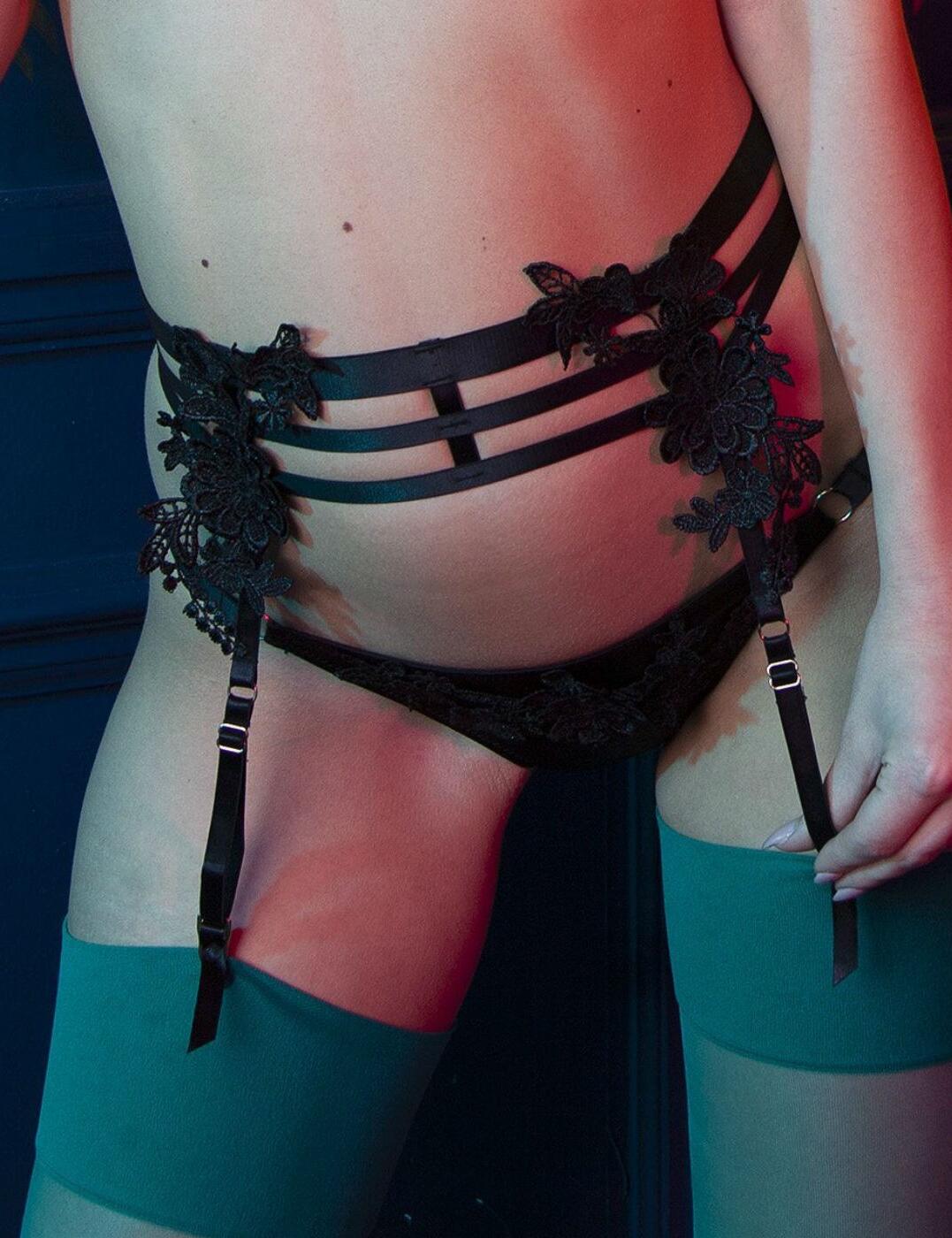 Adorned in a decorative floral lace, this stunning suspender belt is all your lingerie collection needs to be complete! The suspender is part of the Virginia Guipure range from Playful Promises. The beautiful piece features 4 suspender straps, which are adjustable, with a hook and eye closure at the rear for an easy fit. Pair with matching items to complete the look!  Chic and feminine design 4 Adjustable straps Unique floral styling Soft handle materials Easy to wear Hook and eye closure to the rear Matching items available! Listed in UK sizes  41746-76405-1013062 PPSB3151 Suspender