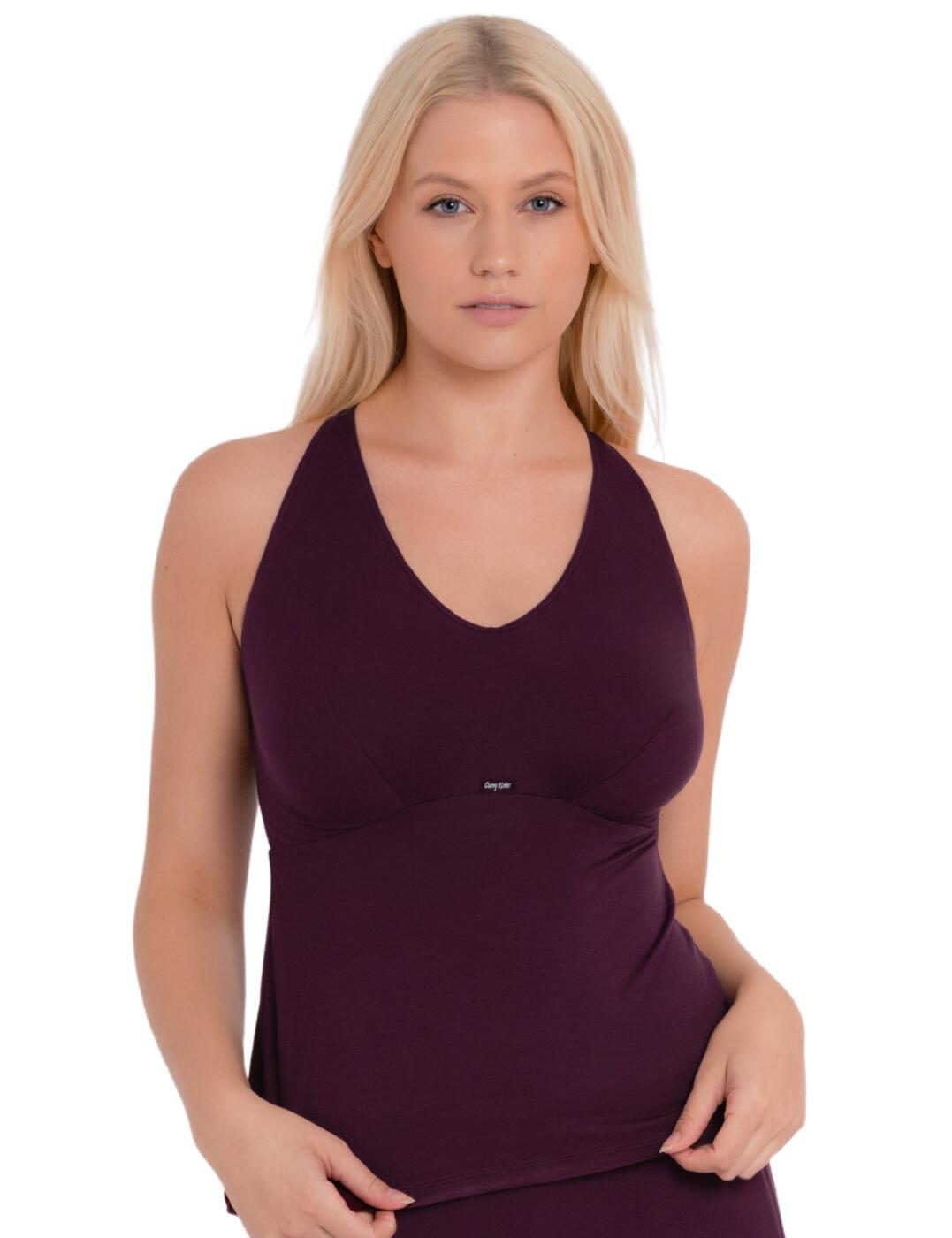 This Softease vest top by Curvy Kate is the perfect addition to your loungewear collection and is designed to flatter. The pull-on design features racerback straps that highlight your shoulders and back. A hidden underband offers light support without underwiring and a slightly flared middle offers a comfortable and flattering fit. The scooping neckline gives a feminine fit while still preserving modesty and support. Pair with matching items from the collection to create a coordinated look.  Scooping neckline Racerback shoulder straps Hidden supportive underband Country of origin: China Composition: Main: 94% Viscose &pipe; 6% Elastane Composition: Mesh: 90% Polyamide &pipe; 10% Elastane Listed in UK sizes  55595-99057-1282944 CN054322 Camisole Top