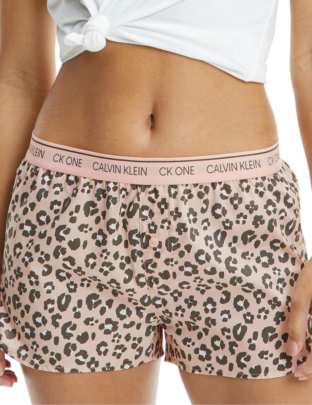 Calvin Klein's CK One Lounge range is perfect for those wanting to introduce pure comfort to the bedroom this season. These sleep shorts are crafted from premium cotton that gives them a breathable, soft feel with each wear. Cut to a flattering mid-rise waist that highlights your curves and also features a soft elasticated waistband that has the signature Calvin Klein logo detailing for a chic designer look. Falling to a flirtatious mini length with a stylish curved hem, these shorts ensure you can look as good as you feel.  Cute and so comfortable Signature Calvin Klein waistband Mid-rise waist Curved hem Fun chic print Breathable cotton Country of origin: Sri Lanka Composition: 100% Cotton Listed in UK sizes  56198-99792 000QS6437E Sleep Short
