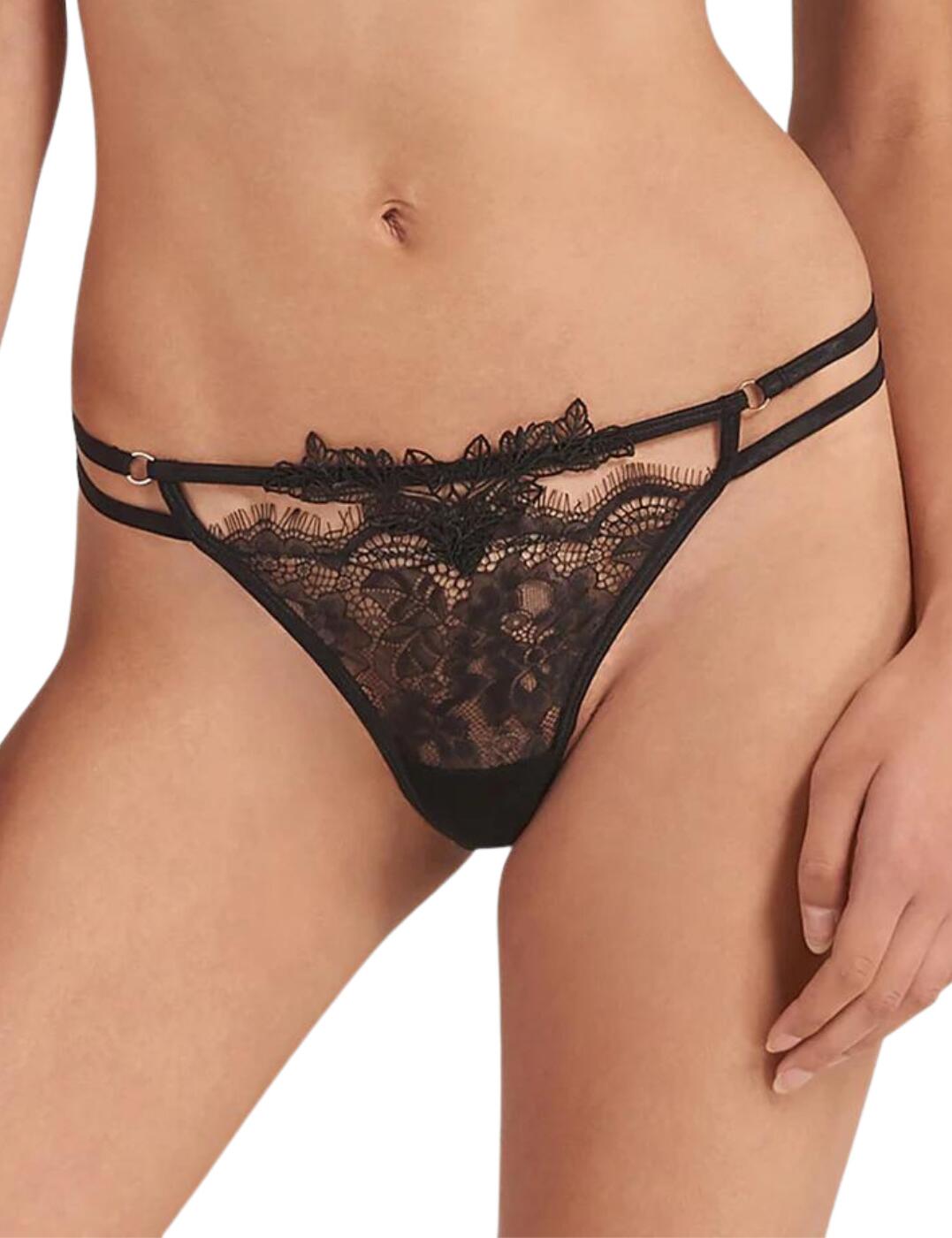 Bluebella's sexy Lumi range introduces this jaw-dropping thong that creates an alluring and elegant look. The front features delicate lace with a leaf embroidery detail at the centre waistband whilst the sides and rear have a strappy and string design that flatters your silhouette and showcases your beautiful figure. It sits low-rise and provides minimal rear coverage. Made complete with gold hardware circles at the waistband which matches the other coordinating items that are also available.  Flirty thong Low-rise waist and minimal rear coverage Delicate lace front with leaf embroidery Strappy double waistband Gold hardware circle charms Other matching items are also available Country of origin: China Composition: 49% Polyamide &pipe; 49% Polyester &pipe; 2% Elastane Composition: Gusset: 100% Viscose from Bamboo &pipe; Excluding trims Listed in UK sizes  41075-BK-8 41075  Thong