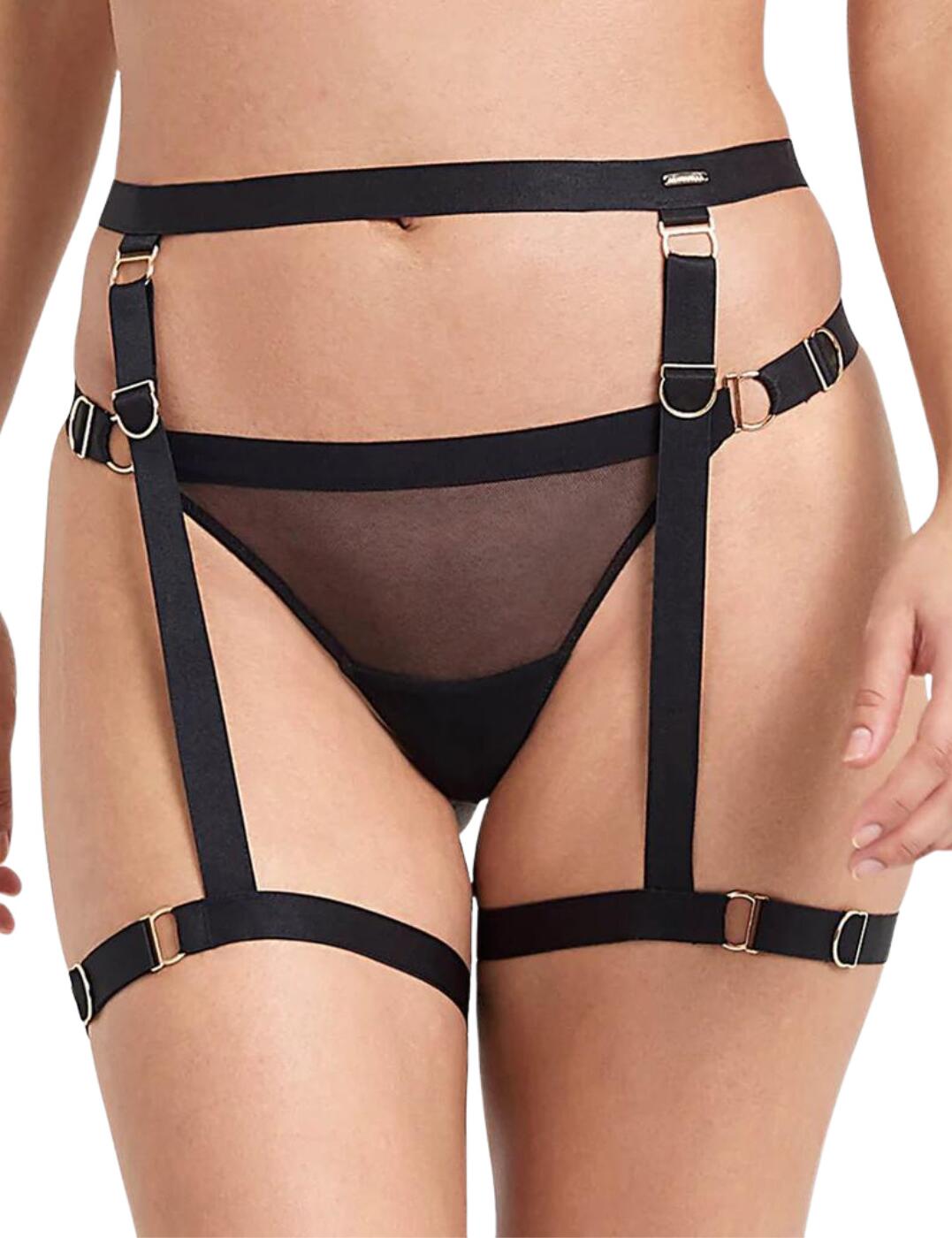 Made to take your lingerie look to another level, this thigh harness from Bluebella is not one to miss out on. A part of the Thea range, this harness features a bold design with a strappy style that has gold hardware detailing throughout for a luxurious and feminine touch. Each strap has an adjustable clasp allowing you to create a comfortable fit, and the harness closes at the waist with a swan clasp. It's high-rise and sits around each thigh with its fully open look allowing you to showcase your amazing lingerie look.  Thigh harness Strappy design with adjustable features High-rise It sits around the thighs Swan clasp at the waist Luxurious gold hardware Country of origin: China Composition: 74% Polyamide &pipe; 26% Elastane &pipe; Excluding trims Listed in UK sizes  41269-BK-8 41269 Harness