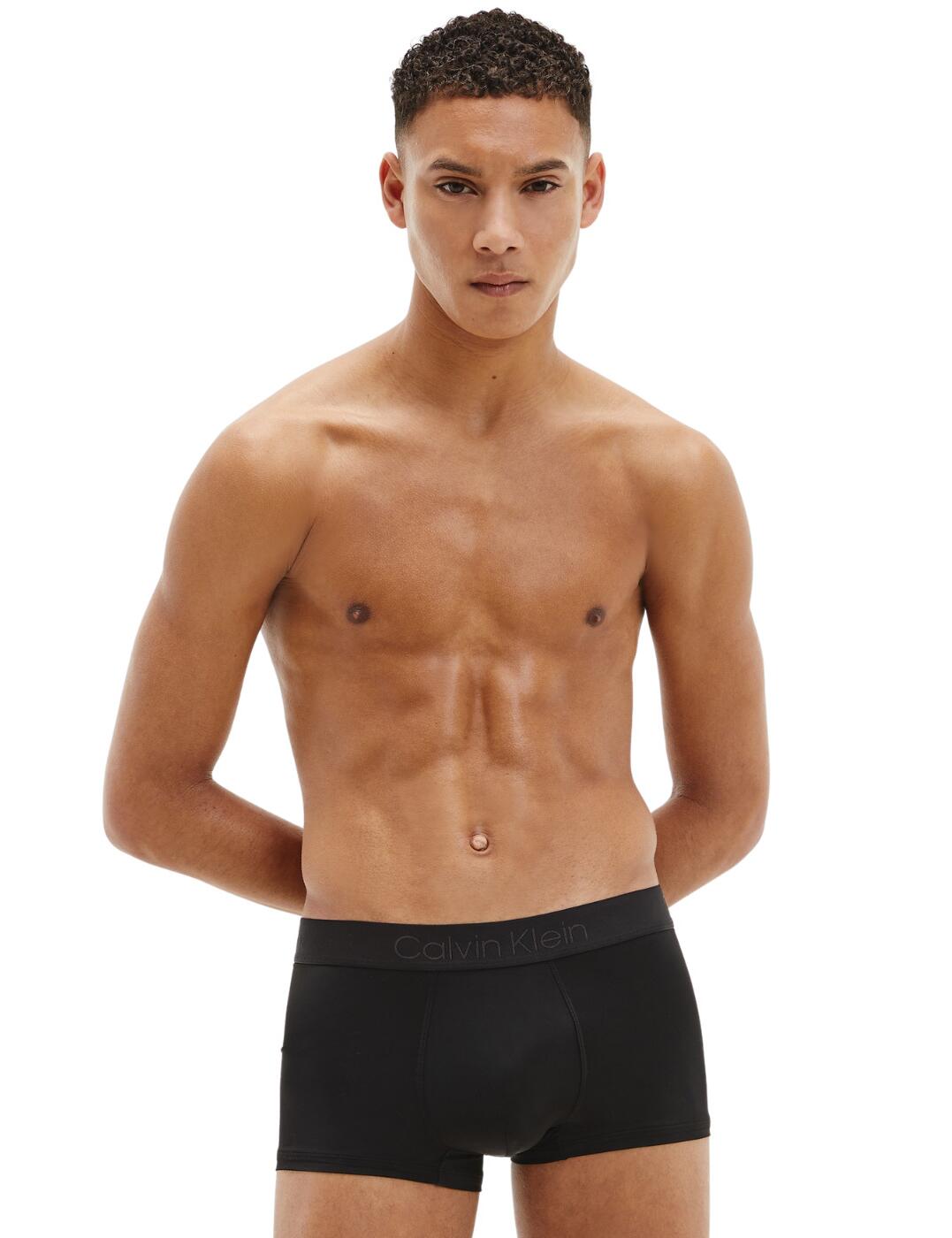 Sophisticated designs crafted from luxurious fabrics with an impeccable fit define Calvin Klein, these iconic trunks are the perfect everyday wear. The classic design from the Smart Micro range boasts a low-rise waist and figure-hugging fit. They can also double up as a pair of loungewear shorts and paired with a lounge tee that will ensure a cosy and soft feeling.  Low-rise fit Short length design Calvin Klein waistband Comfy and soft materials Country of origin: China Composition: 84% Polymide &pipe; 16% Elastane Listed in UK sizes  57174-101062-1309358 000NB1929A Men's Trunks