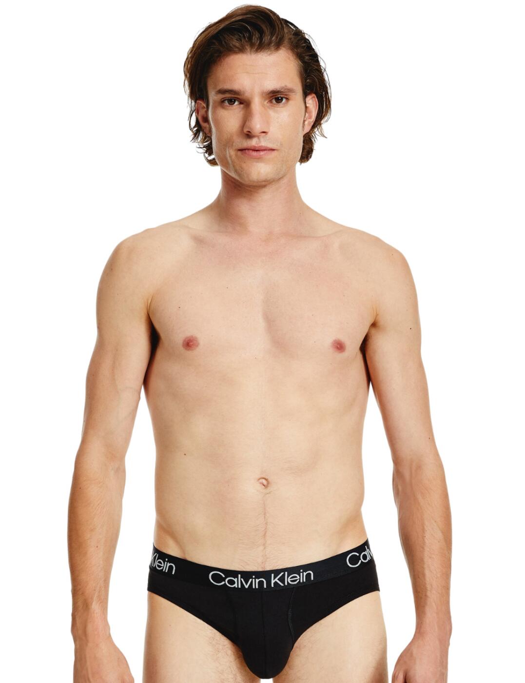 These Calvin Klein hip briefs are the perfect fit, hugging around the hips and gently highlighting the shape of your thighs. With the convenient 3-pack, you'll get more chances to wear the same design throughout the week. From the Modern Structure series, these briefs are created with recycled materials topped by the iconic logo waistband in a modern matte and shiny finish.  Signature bold Calvin Klien waistband Multipack of 3 Recycled materials Matte and shiny finish From the Modern Structure series Country of origin: India Composition: 57% Cotton &pipe; 38% Recycled Polyester &pipe; 5% Elastane Listed in UK sizes  57175-101064-1309442 000NB2969A Men's Hip Brief