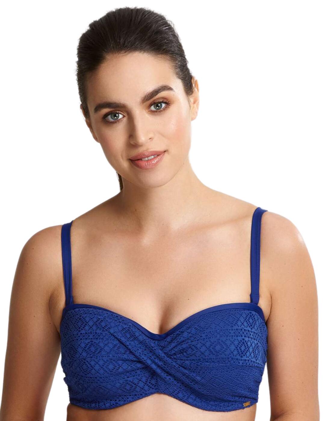 The Anya Range by Panache now features this stunning Padded Bandeau Bikini Top. This is a classic style presented in a lightweight crochet effect for a beautiful summery addition to your summer wardrobe. Inner foam cups essential for great shape and maximum support in a strapless style bikini. Powermesh side wings with side bone to provide you with extra comfort aswell as more firm support. Simple and easy clasp fastening to the back. Pair with matching items to complete your look.  Classic style Lightweight Summery addition Foam cups Clasp fastening Matching items available Composition:- 80% Polyamide&pipe; 20% Elastane Listed in UK Sizes    42348-77523-1032036 SW1253 Padded Bandeau Bikini Top