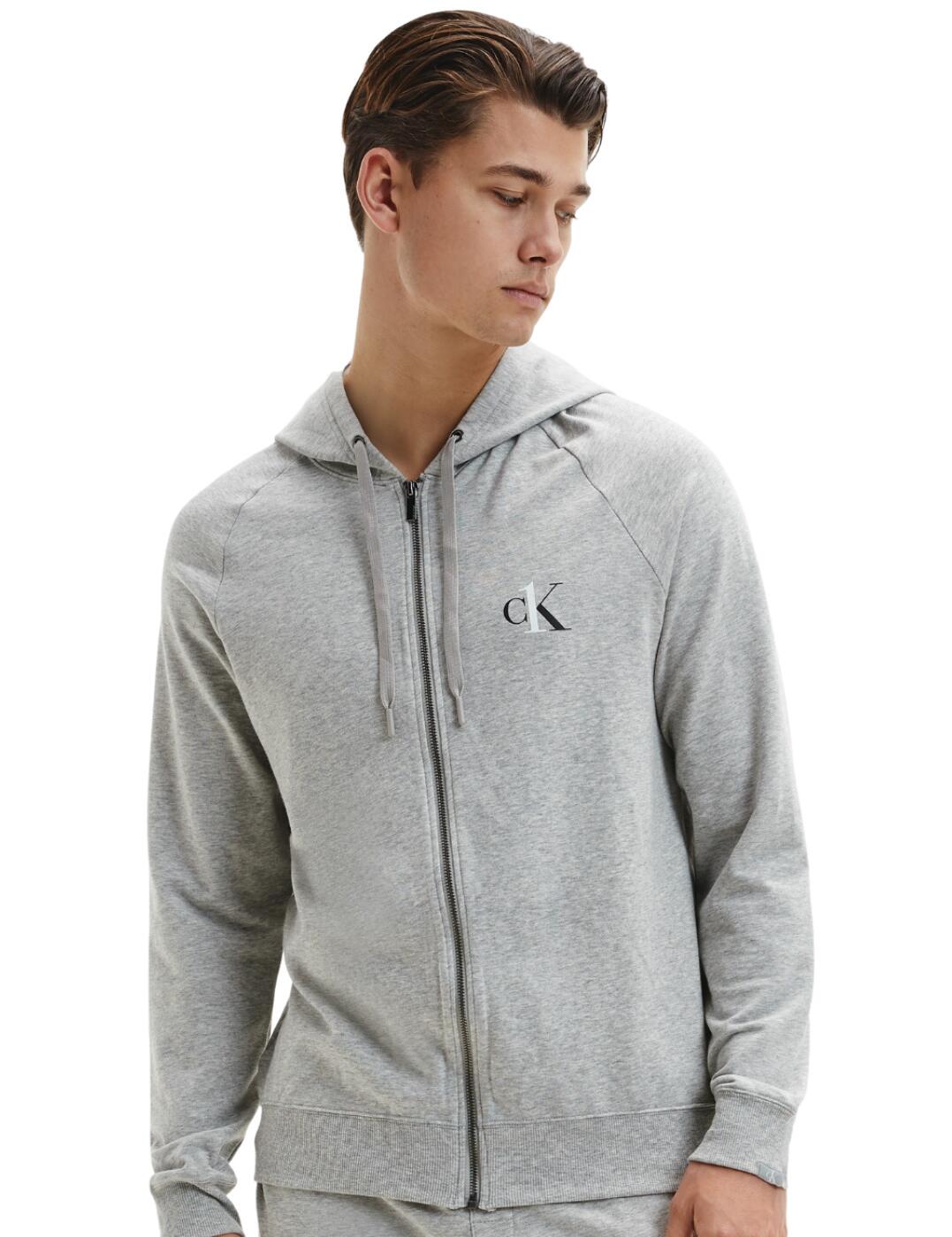 This Hoodie from Calvin Klein CK One range is perfect for the colder days to complete a stylish look. The zip allows for air to get to your body if you're a little warm but get allows you to keep warm if you're feeling a little cold. The hood provides extra warmth and even protection from indecisive weather. The CK logo placed on the left side of the hoodie boats a designer brand with a comfortable style.  Calvin Klein branding From the CK One line The hoodie has drawstring pulls to adapt to your desired fit Comfortable design Full zip hoodie Long sleeved Country of origin: Sri Lanka Composition: 57% Cotton &pipe; 38% Polyester &pipe; 5% elastane Listed in UK sizes  57202-101120-1310875 000NM1865E Men's Hoodie