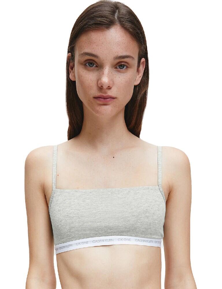 Introducing this timeless and classic bralette from Calvin Klein's CK One Cotton range! The bralette is seamless and non-wired for a smooth and comfortable fit allowing you to move freely, offering a natural fit and feel! Featuring non-adjustable shoulder straps and the supportive and elastic, signature CK logo underband. This bralette is designed for your everyday lingerie collection!  Contemporary design Comfortable fit Non-adjustable shoulder straps Signature Calvin Klein underband Seamless cups for comfort Comes in a 2 pack Matching briefs available Composition: 95% Cotton &pipe; 5% Elastane Listed in UK sizes  43209-80660-1088489 QF6040E  2 Pack Bralette