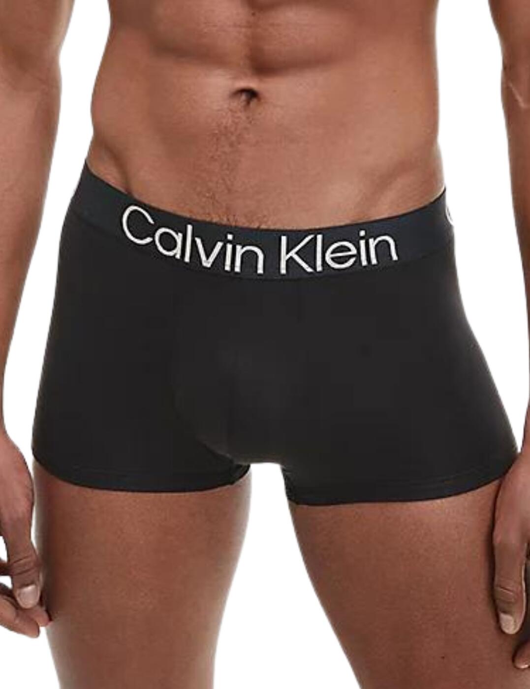Calvin Klein's CK One low-rise trunks are designed for ultimate comfort. Made from ultra-soft microfibre jersey, these trunks have a classic snug fit. The signature Clavin Klein branded elastic waistband ensures they will stay in place all day. The low-rise waist is suitable for any outfit and the short leg length rests at your upper thigh.  Low-rise waist Short leg length CK branded elastic waistband Microfibre jersey Snug fit Country of origin: Kenya Composition: 88% Recycled Polyester &pipe; 12% Elastane Listed in UK sizes  57654-101718 000NB3112A Men's Brief