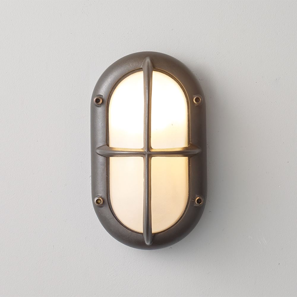 Davey Small Oval Exterior Bulkhead Fitting With Guard Weathered Brass Wall Lighting Bronze