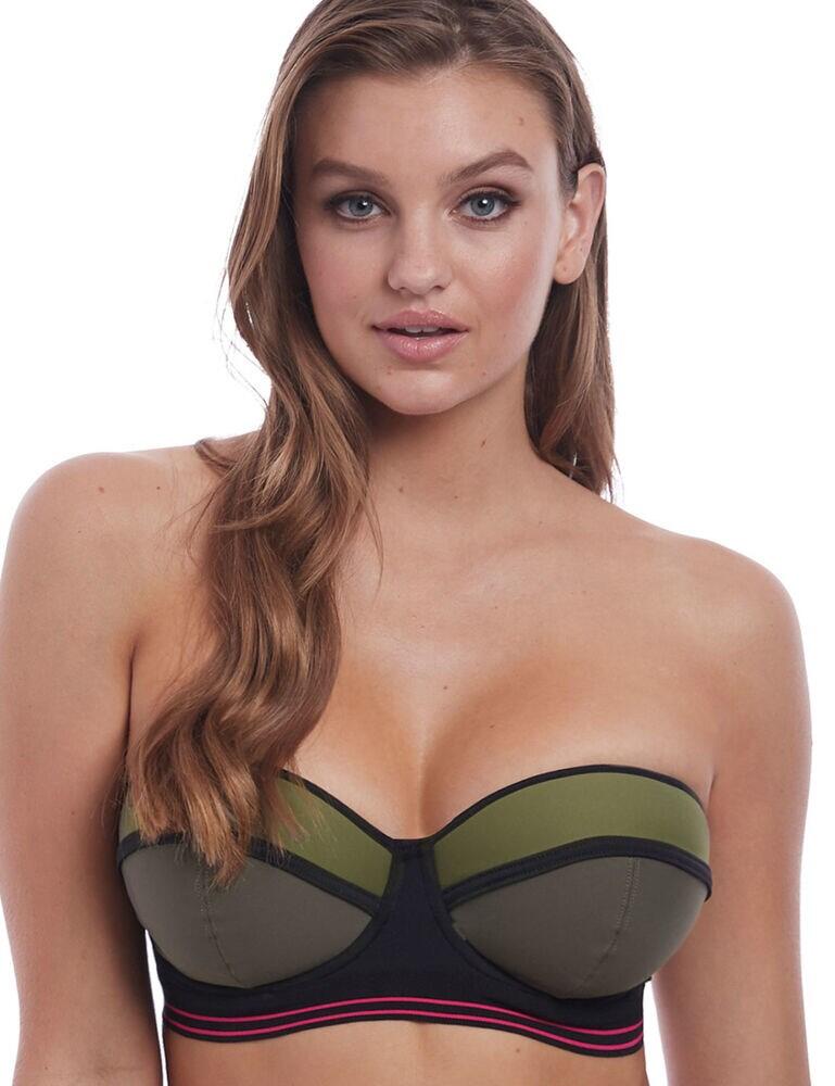 Freya' Club Envy range is styled with a modern twist on sports luxe. Designed with on-trend colour-blocking and contrast binding for an eye-catching look. This must-have style features lightly padded foam cups, offering a rounded shape and excellent support. Detachable straps allow for this versatile style to be worn in multiple ways as best suits you. It fastens with a plastic clasp closure to the rear. Pair with matching coordinates for a fabulous set. Stand out during your beach getaway this summer in the Club Envy collection.  Modern and feminine design Flattering bandeau style Lightly padded foam cups Underwired support Wide elastic underbust Secures at the rear with a plastic clasp Adjustable, convertible and removable straps Matching coordinates available Composition:- 65% Nylon &pipe; 20% Polyester &pipe; 15% Elastane Listed in UK sizes  43806-80570-1093492 6822 Bandeau Bikini Top