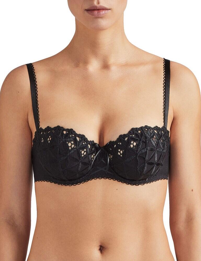 The iconic Bahia Et Moi range has a new lease of life, combining modern and comfortable designs with a delicate touch. Clean-cut cotton knit fabric and classic lacing contrast with the shimmering broderie anglaise streamlining the figure. Your curves are enhanced with this contemporary and sensual collection. A staple Aubade lingerie piece, the half cup bra is reworked as a part of this new collection. Combining freshness with seduction thanks to its push-up cleavage decorated with broderie anglaise and a delicate satin bow. The soft yet rigid straps are fully adjustable and provide an individual fit. Pair this fabulous bra with matching briefs for a coordinated set.  Youthful and feminine design French trim with English embroidery Rigid and soft fully adjustable straps Underwired support Non-padded cups Clean cut Lycra cotton mesh Elastic band with front clasp closure Matching coordinates available Composition:- 54% Cotton &pipe; 43% Polyester Listed in UK sizes  43819-80594-1121198 PY14  Half Cup Bra