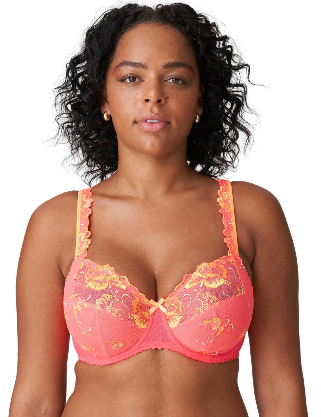 An opulent, floral-inspired design crafts a sensual and vibrant look in this gorgeous full-cup bra from Prima Donna's Devdaha collection! You'll feel and look effortlessly stylish and wonderfully feminine in this piece thanks to the alluring design features and intricate details. Full coverage and the three-piece cup construction give you confidence and support through a lifted bust even in larger cup sizes, while the subtly sheer upper cup suggestively reveals your skin creating an exquisitely luxurious look that doesn't disappoint! Contrasting trims and a bow between the cups further enhance the eye-catching design, drawing the eye in irresistibly and celebrating your curves. Underwiring gives you additional comfort and security, while the non-padded look enables you to retain a beautifully natural feel. Adjustable straps and the hook and eye closure give you a customisable fit you can enjoy all day and all night! Pair with coordinating briefs from the Devdaha range to complete this timeless, exuberant look!  Luxury full-cup bra Full cup coverage Vibrant all-over embroidery Underwired for support Non-padded for comfort Sheer upper cups Contrasting trims on straps Bow detail on the centre front Adjustable shoulder straps Hook and eye fastening Matching coordinates available Composition: 39% Polyamide &pipe; 31% Cotton &pipe; 17% Polyester &pipe; 13% Elastane Listed in UK sizes  62458-107813-1429918 0163440 Full Cup Bra