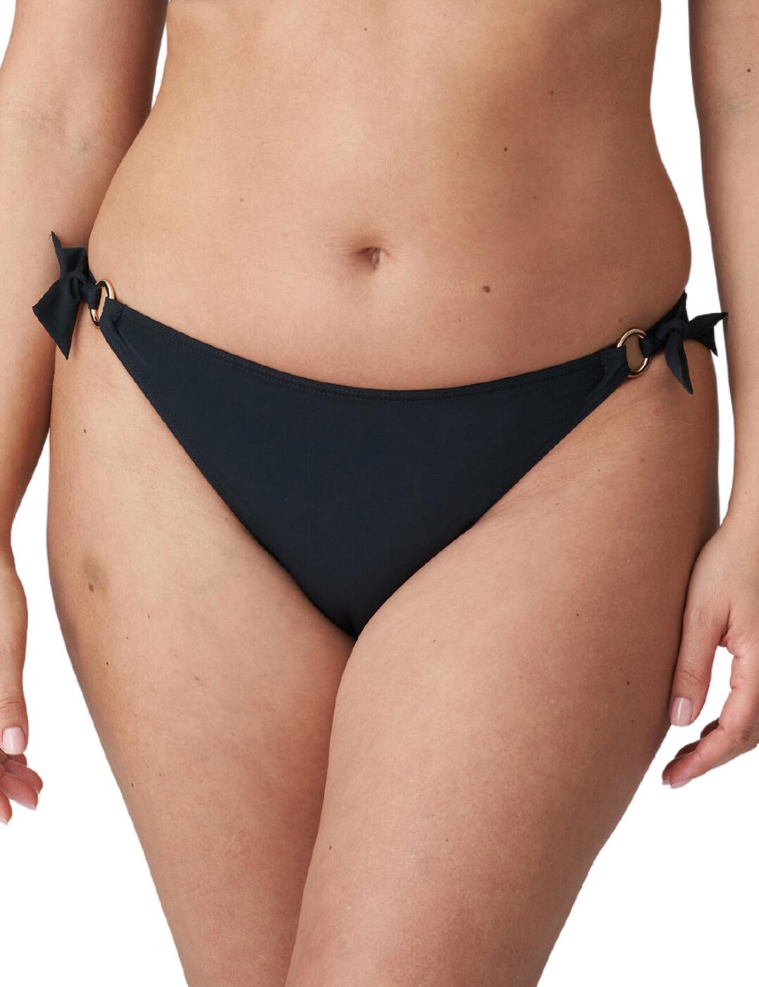 Are you looking for a chic and stylish swimwear solution that will help you stand out from the crowd? Look no further than the Prima Donna Damietta tie side bikini brief! This timeless, low-rise bikini brief features moderate rear coverage that ensures it s secure without feeling restrictive. The simple design is accentuated by metallic ring detailing which adds an eye-catching hint of glamour and luxury to your look. What s more, matching styles are available so you can coordinate your looks from day to day with ease.