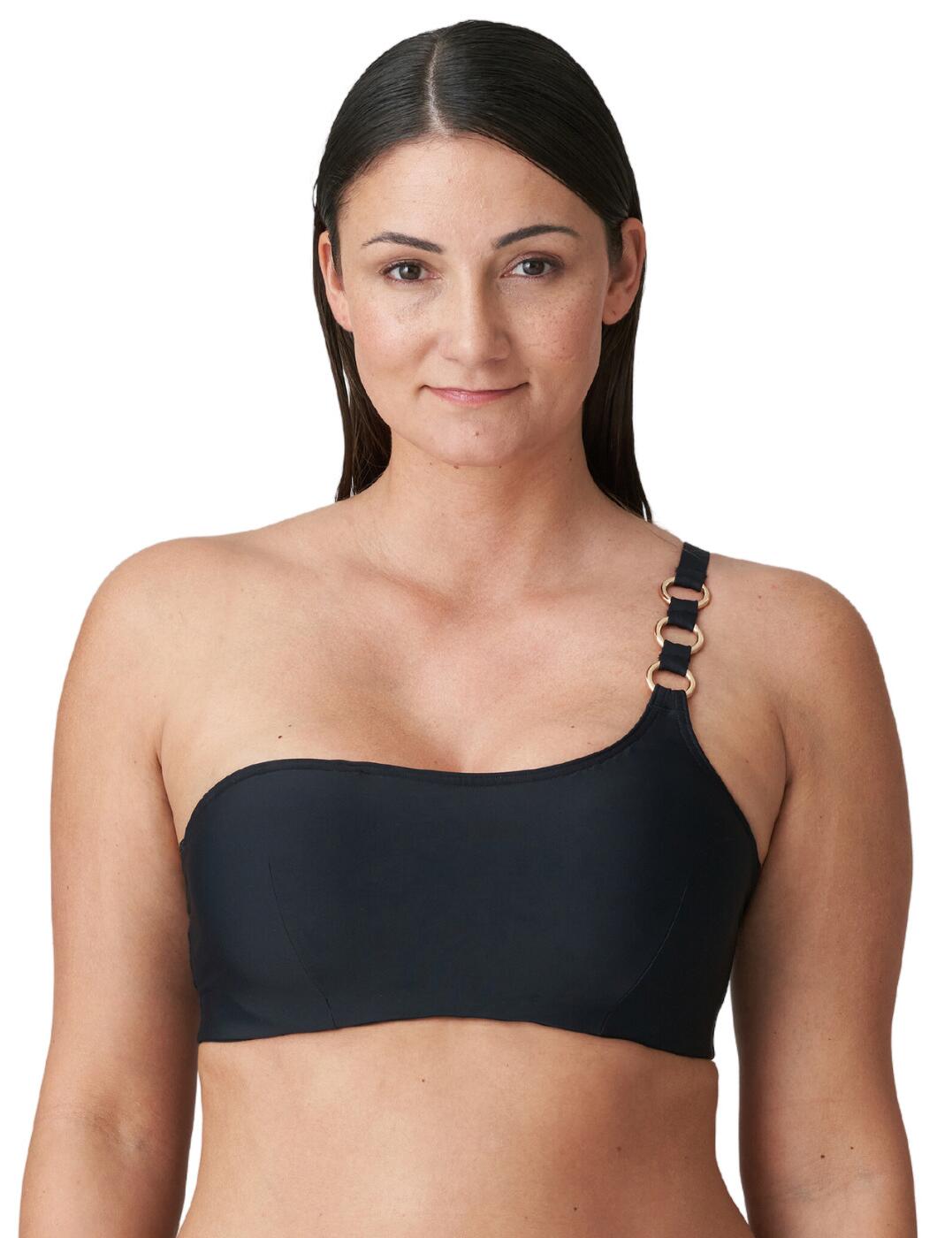 Say goodbye to those pesky straps and look great when you hit the beach wearing the Prima Donna Damietta strapless bikini top. This gorgeous strapless bikini top provides shape and support with underwired and padded cups. The hook and eye fastening keeps everything secure while the removable adjustable straps give you plenty of freedom to customize your look while tanning. To take your style up a notch, metallic ring detailing on the strap adds an element of sophistication to any outfit. Plus, matching swimwear is available for a complete summer wardrobe.  Gorgeous strapless bikini top Padded cups Underwired Removable adjustable straps Hook and eye fastening Metallic ring detailing on the strap Matching swimwear available Composition: 50% Polyamide &pipe; 33% Polyester &pipe; 17% Elastane Listed in UK sizes  62590-107973-1431403 4011617 Padded Strapless Bikini Top