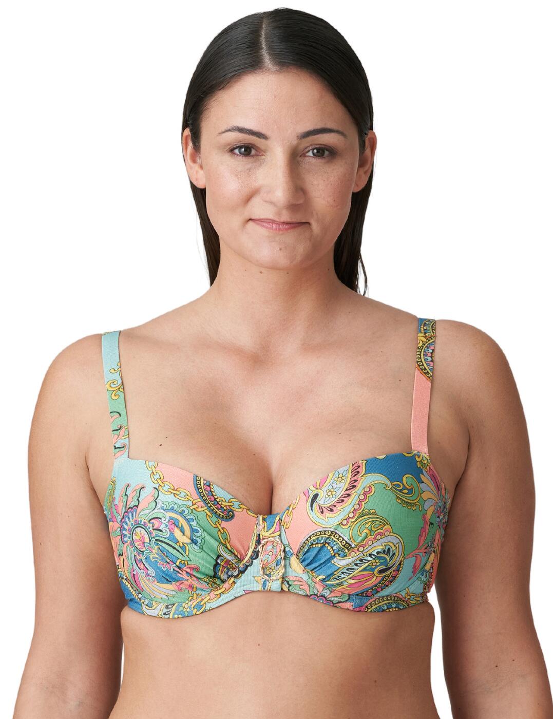 Radiate sophistication and decadent Italian style in this luxurious balcony bikini top from Prima Donna's Celaya collection! You'll be turning heads at the beach or pool thanks to the gorgeous, retro print that shimmers alluringly in the sun. What's more, the padded mousse cups while the horizontal balcony cups show off your cleavage perfectly! Underwiring, hook and eye closure, and adjustable, multiway straps give you a range of looks and customizability so you can find your perfect fit! Finished off with eye-catching decorative, metallic braided details between the cups. Pair with matching briefs from the Celaya range to elevate this look even further!