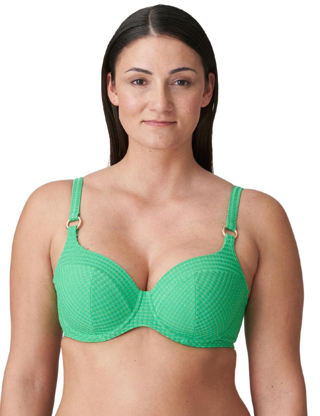 Craft a retro look that exudes luxury with this gorgeous heartshape bikini top from Prima Donna's Maringa range! Combining elegant sophistication with a stylish twist, this bikini top will have you turning heads at the beach or pool! The padded cups, underwiring, and feminine, heartshaped neckline effortlessly give you a stunning silhouette with irresistible cleavage, while still ensuring you are supported and comfortable as you enjoy your day. The textured, ribbed fabric adds to the luxurious feel of this piece, and the shimmering, eye-catching accents throughout the material really elevate the opulence and timeless design on offer. The rings joining the adjustable straps to the cups complete the look with a trendy flourish! A plastic back clasp closure further secures your fit. Pair with matching bikini briefs from the Maringa range to take this look even further!