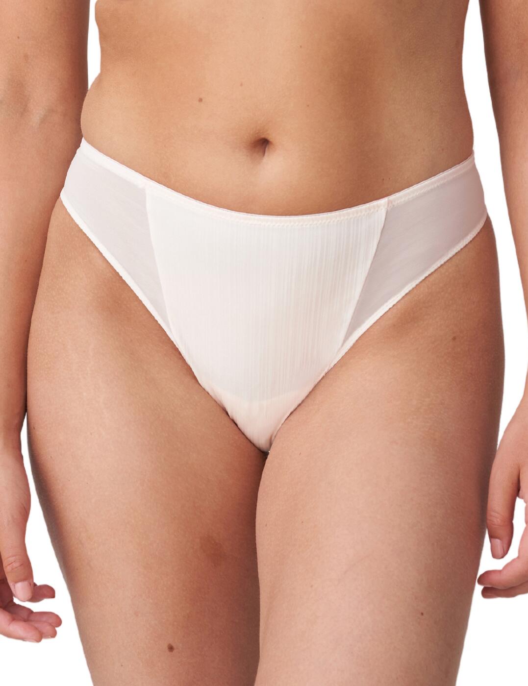 Provocative and playful, with a luxurious feel, this gorgeous thong from Prima Donna Twist's Knokke range is set to become a firm favourite in your lingerie collection! Sensual, soft fabric feels wonderful against your skin, meaning you can feel supremely comfortable while still enjoying a flirty, alluring look! Pinstripe print and a satiny, shiny visage are eye-catching and subtle, exuding sophistication and quality with ease. Your curves will be framed perfectly thanks to the provocative, minimal rear coverage and mid-rise waist! Pair with a matching bra from the Knokke range for a truly show-stopping look!  Elegant thong Soft and sensual fabric Shiny, pinstripe print Semi-sheer side panels Minimal rear coverage Mid-rise waist Matching items available Composition: 70% Polyamide &pipe; 21% Elastane &pipe; 9% Cotton Listed in UK sizes  62698-108103-1435026 0642330 Thong