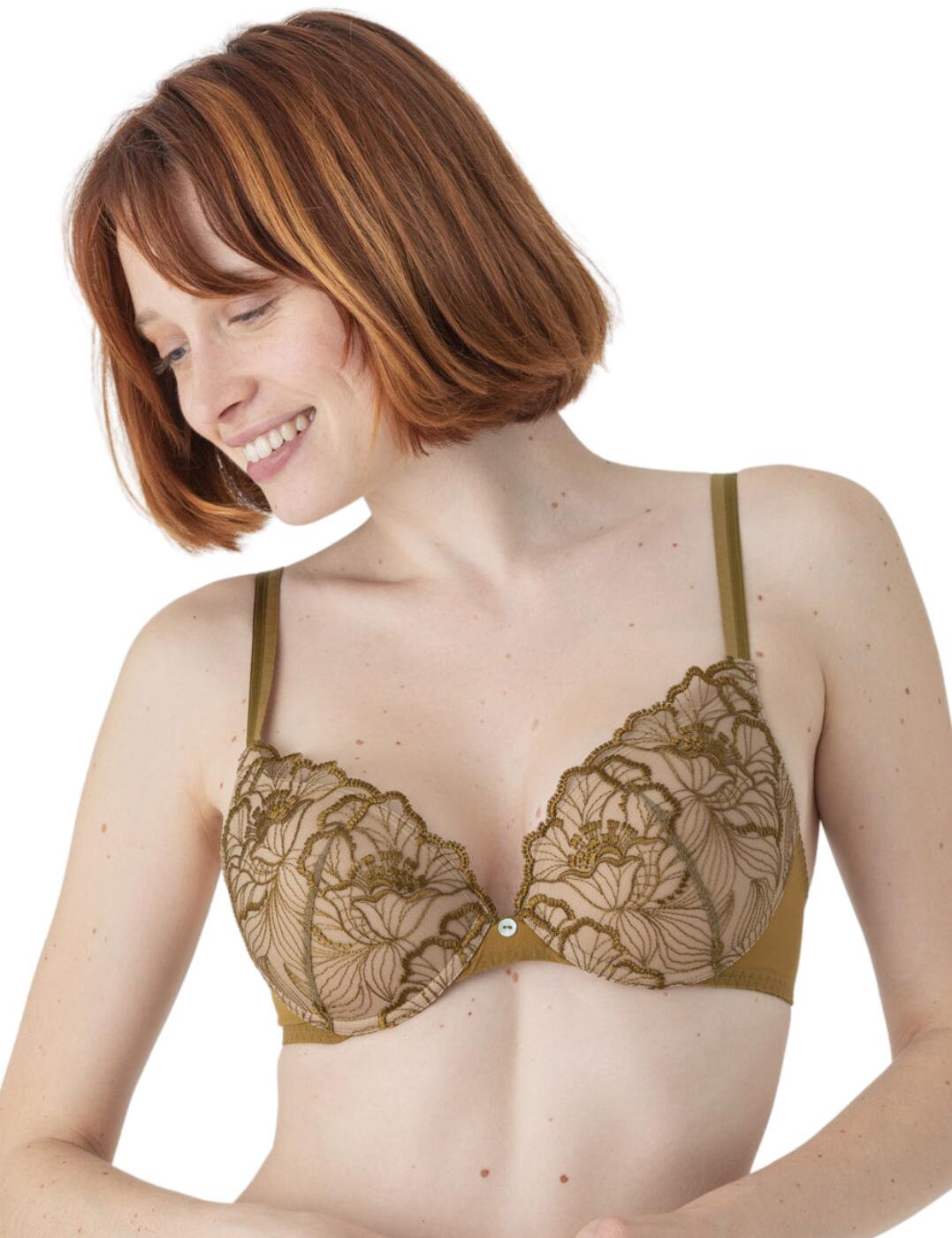 The Flora range by Maison Lejaby introduces this beautiful push-up bra which features, all over sheer embroidery cups, double strap detail, a button charm in the centre and a super flattering fit. This bra provides full coverage with progressive padding that creates a push-up effect giving your cleavage an extra feminine boost. It also ensures a comfortable and supportive fit which can be created with a hook and eye closure, underwire and adjustable straps.  Light Foam Push-up bra All-over sheer embroidery Double adjustable straps Button charm in the centre Full coverage bra with progressive padding Supportive underwire Hook and eye closure Country of origin: Tunisia Composition: 76% Polyester &pipe; 18% Polyamide &pipe; 6% Elastane Listed in UK sizes  56313-99981-1299179 21231 Push Up Bra