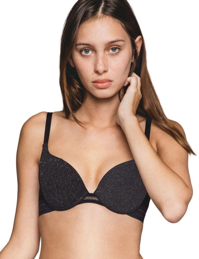 If you're looking for a sexy new bra that will stand out from your collection, then this underwired push up bra from the Nufit Galaxie range by Maison Lejaby is perfect for you. This bra features glittery cups which is subtle yet very pretty. The back of the bra also has stripes which give this bra even more of a contemporary look. This bra is underwired for support and lift as well as being padded and moulded for extra shape which give the 'push up' effect. The straps are adjustable for a unique fit and this bra secures at the rear with a hook and eye closure. Pair with matching items from the Nufit Galaxie range for a sparkling look.  Modern, unique design Comfortable fit Sexy plunging style Underwired support Padded, moulded cups Adjustable straps Hook and eye closure Composition: 50% Polyester &pipe; 38% Nylon &pipe; 12% Elastane  Listed in UK sizes  44134-81377-1122895 181031 Push Up Bra
