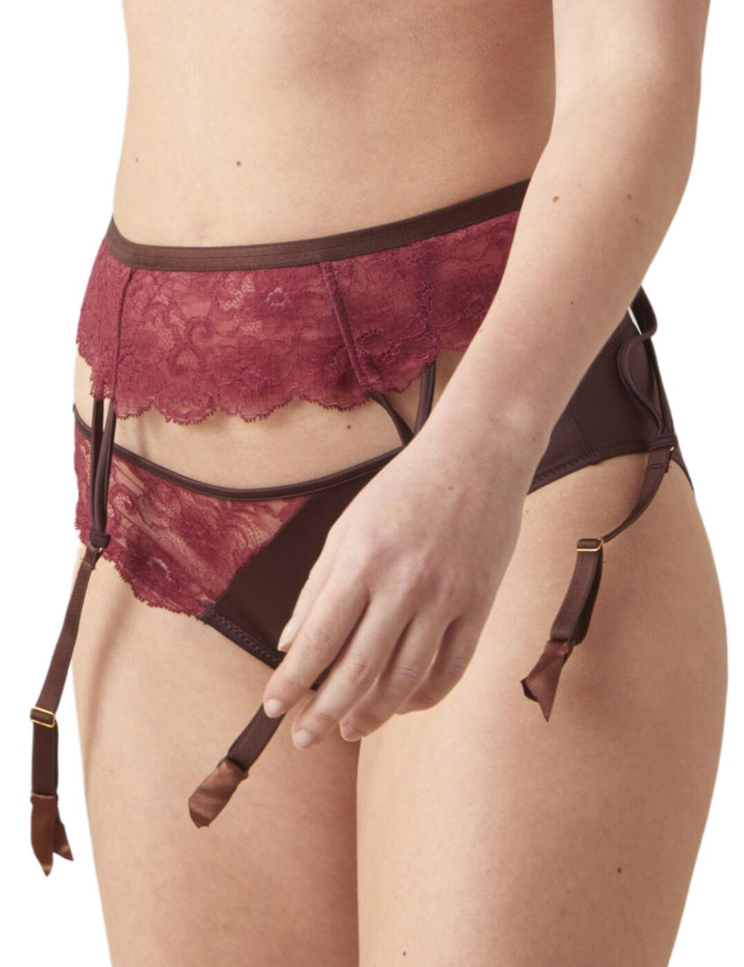 Indulge in Maison Lejaby's La Manufacture collection this season for a taste of premium excellence. This garter belt is the final touch to any lingerie set, crafted from gorgeous Leavers lace that frames and accentuates your beautiful curves. This garter belt features fully adjustable suspender straps that allow you to tailor the fit entirely to your own desires. Cut to a high-rise waist with a hook and eye closure that ensures you can cinch your waist giving you that hourglass silhouette of your dreams. Complete your favourite lingerie set with this iconic garter belt!  Leavers lace to adorn your beautiful figure Adjustable suspender straps High-rise waist Hook and eye closure Satin trim Country of origin: Tunisia Composition: 88% Polyamide &pipe; 12% Elastane Listed in UK sizes  56359-100042-1299278 211170 Garter Belt