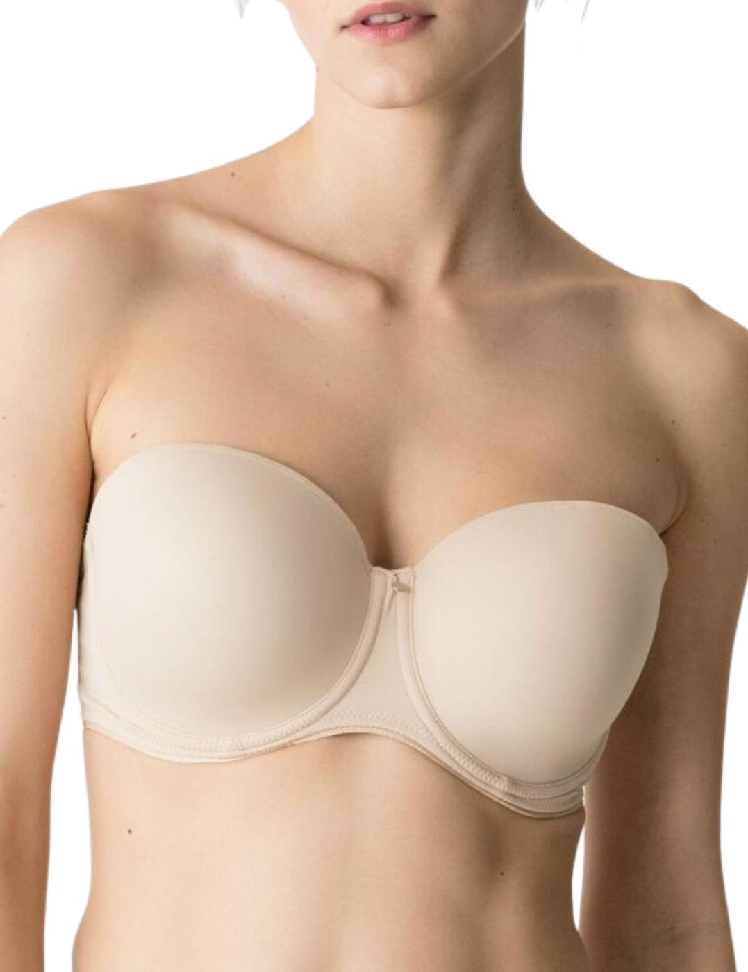 Finding the perfect strapless bra can be hard, but this is the one that you have been looking for. Introducing the padded strapless bra from the Perle range by Prima Donna. This bra features a simple, pretty styling which has an added feminine touch thanks to the fine guipure pattern which adorns the shoulder straps. This bra is padded and underwired for a lifted, fuller bust. The adjustable straps are detachable so this bra can be worn strapless, or with straps which are wide apart and so can be worn with a wide neckline. This bra secures at the rear with a hook and eye closure. Pair with matching items from the Perle range for a stunning look.  Chic, classic look Gorgeous fine guipure pattern on shoulder straps Adjustable straps which are detachable Padded foam cups Underwired cups for support Fastens with hook and eye closure at the back Matching co-ordinates available! Composition: 37% Polyurethane &pipe; 33% Polyester &pipe; 23% Polyamide &pipe; 7% Elastane Listed in UK sizes   44196-81511-1098745 0162348/0162349 Strapless Bra