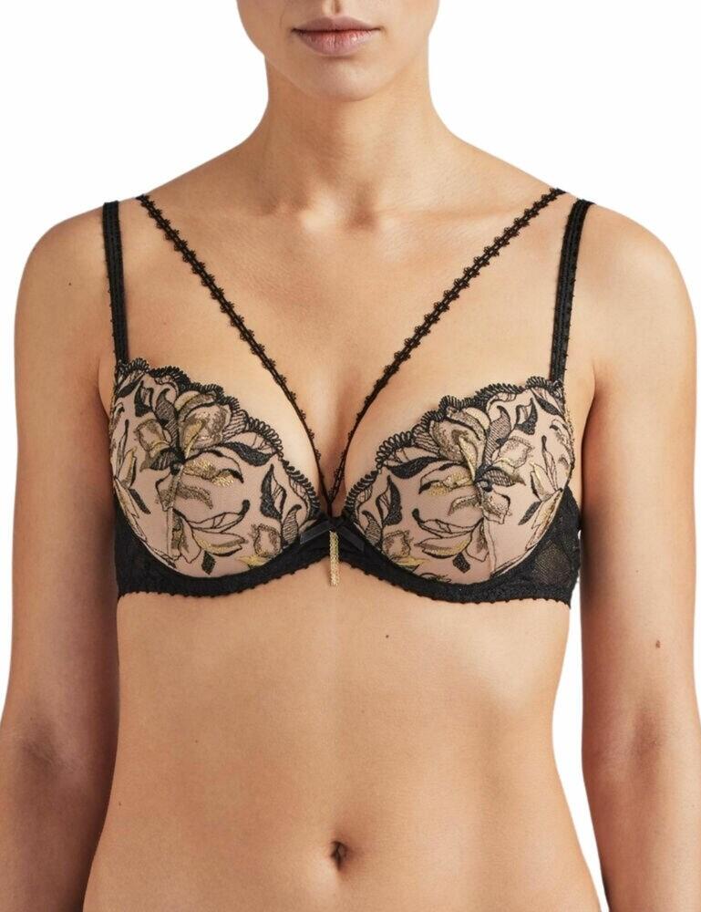 Introducing the stunning Encre De Chine range by Aubade, featuring this stunning moulded plunge bra. This bra features stunning embroidery which is utterly exquisite. Extra decorative accents such as a bow in the centre and brass pendant had an extra hint of style to this bra. The neckline also features a detachable elasticated band which adds extra sexiness. The cups are underwired for support and uplift and moulded for a better shape and push-up effect. The plunge style is very sexy and allows you to showcase your cleavage. This bra secures at the rear with a hook and eye closure and the straps are adjustable. Pair with matching items from the Encre De Chine range for a look to wow.  Stunning, feminine design Intricate embroidery Gorgeous decorative accents Detachable elasticated band on neckline Underwired cups for support and uplift Moulded, padded cups for shape and push-up look Sexy plunge style Adjustable straps Secures at the rear with hook and eye Matching co-ordinates available! Composition: Cup embroidery - 54% Polyester &pipe; 34% Polyamide &pipe; 12% Elastane Lace front and back - 77% Polyamide &pipe; 23% Elastane Lining - 100% Polyester Listed in UK sizes  45886-84265-1120342 QF08-N Plunge Bra