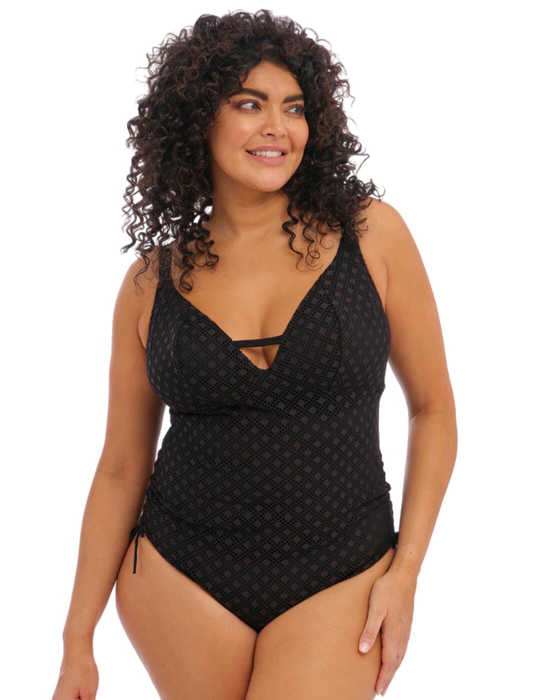 Add a stylish boho-inspired look to your swimwear collection with the trendy Bazaruto collection by Elomi. This flattering swimwear is crafted from a stylish crochet-look fabric with a modest opaque lining and flirty plunging neckline design that highlights your beautiful curves. The adjustable side ruching ties allow you to control the leg and rear coverage to your preferred style and the adjustable shoulder straps ensure the perfect individual fit. A Powernet panel adorns the inner cups for added support to the non-wired design and the classic clasp fastening ensures a secure fit. Adjustable shoulder straps create an individual fit and the classic clasp fastening ensures a secure fit.  Stylish crochet fabric Flattering swimsuit Cut-out back feature Plunge neckline Powernet lining Adjustable ruching at sides Moderate rear coverage Non-padded cups Wireless design Adjustable shoulder straps Secure clip fastening Country of origin: Sri Lanka Composition: 86% Polyamide &pipe; 14% Elastane Listed in UK sizes  59794-104569-1369507 800643 Swimsuit