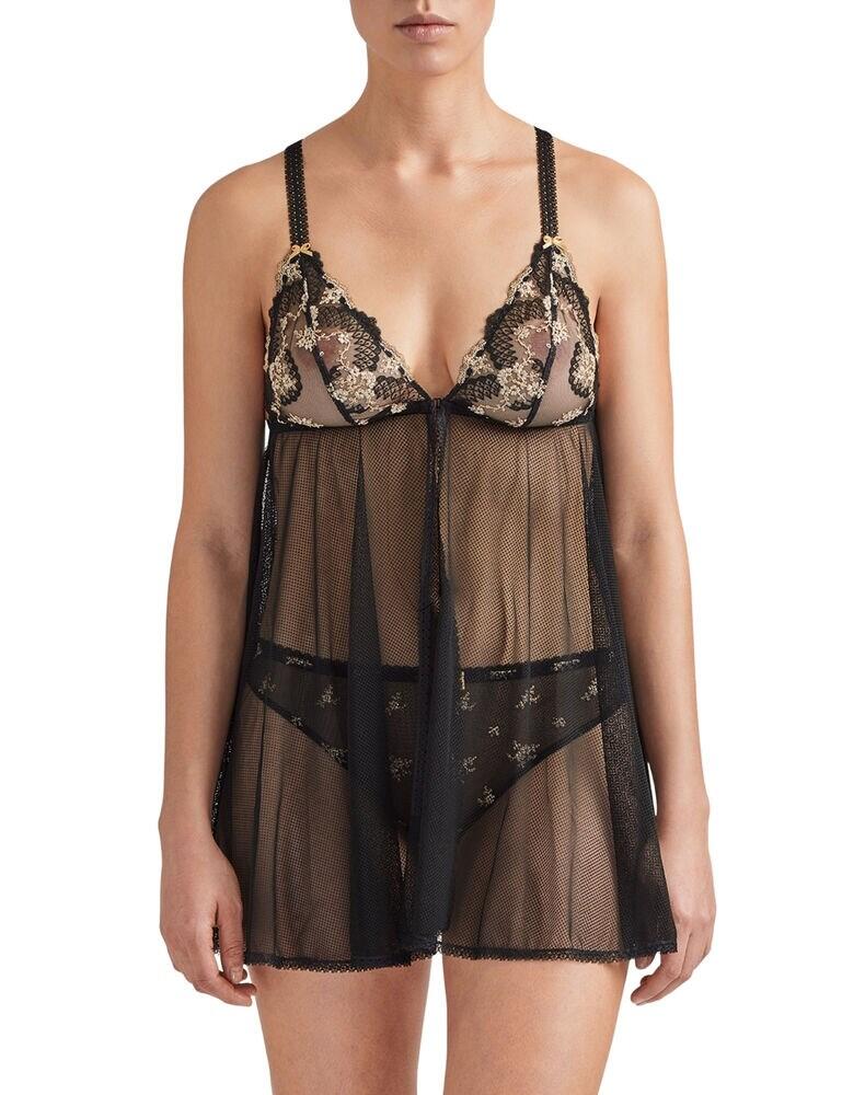 Lightweight and seductive, this babydoll from the La Belle Galante range at Aubade is the perfect addition to your lingerie drawer whether it's for special occasions, every day or nightwear. A fully transparent body makes for a flirty effect. The cups are also sheer for a peek-a-boo seductive look. The cups are non-wired for comfort and adorned with stand-out floral embroidery for a delicate feminine addition. The straps are adjustable in a racerback style for greater movement and a secure fit.  Transparent with peek-a-boo effect babydoll Non-wired Floral embroidery on cups Adjustable straps Racerback style straps Composition: 76% Nylon &pipe; 24% Elastane Listed in UK sizes  48049-87476-1168855 QB42 Babydoll